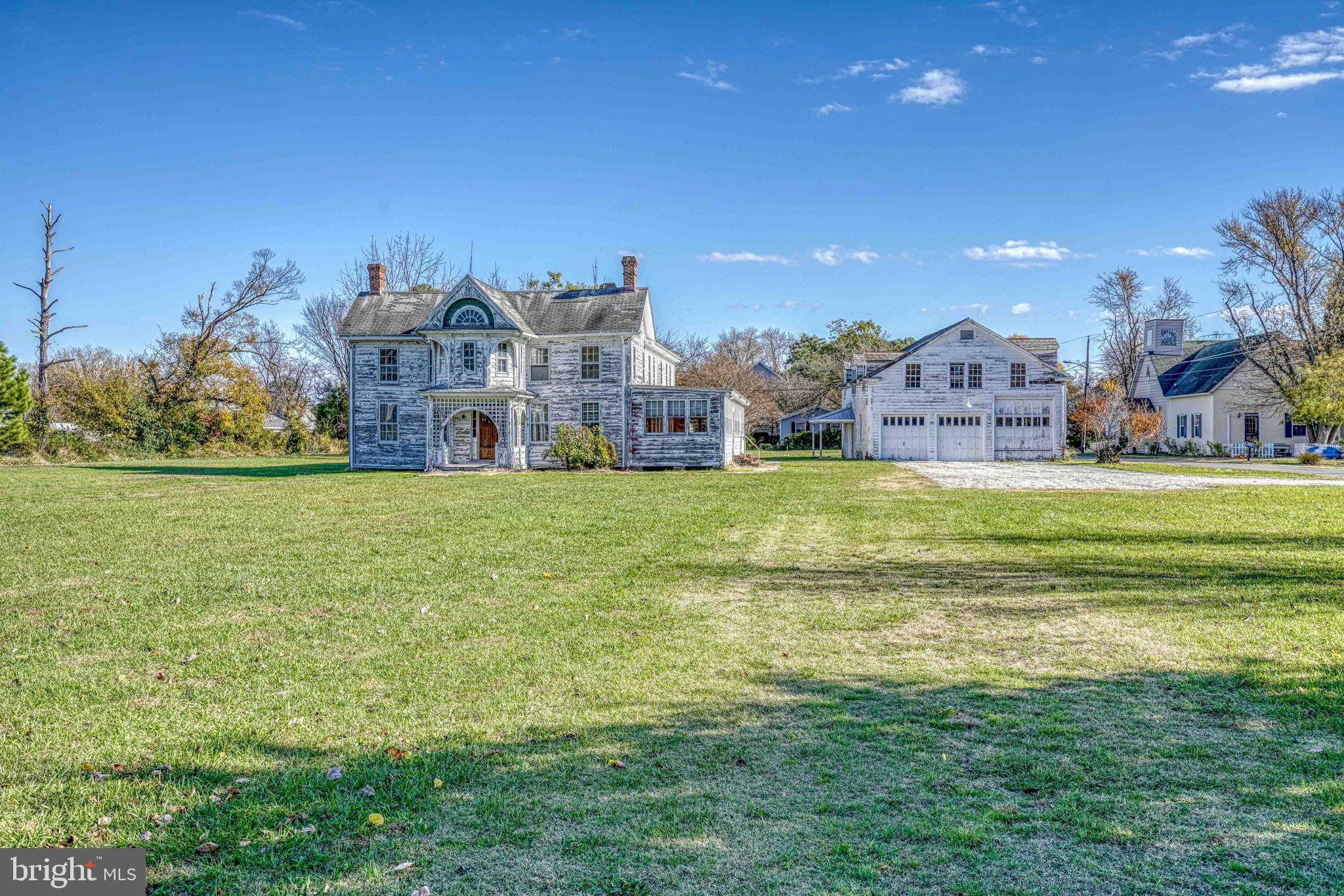 21486 Mission Road Tilghman, MD 21671 - Photo 23 of 32 a view of a city with tall buildings and a big yard