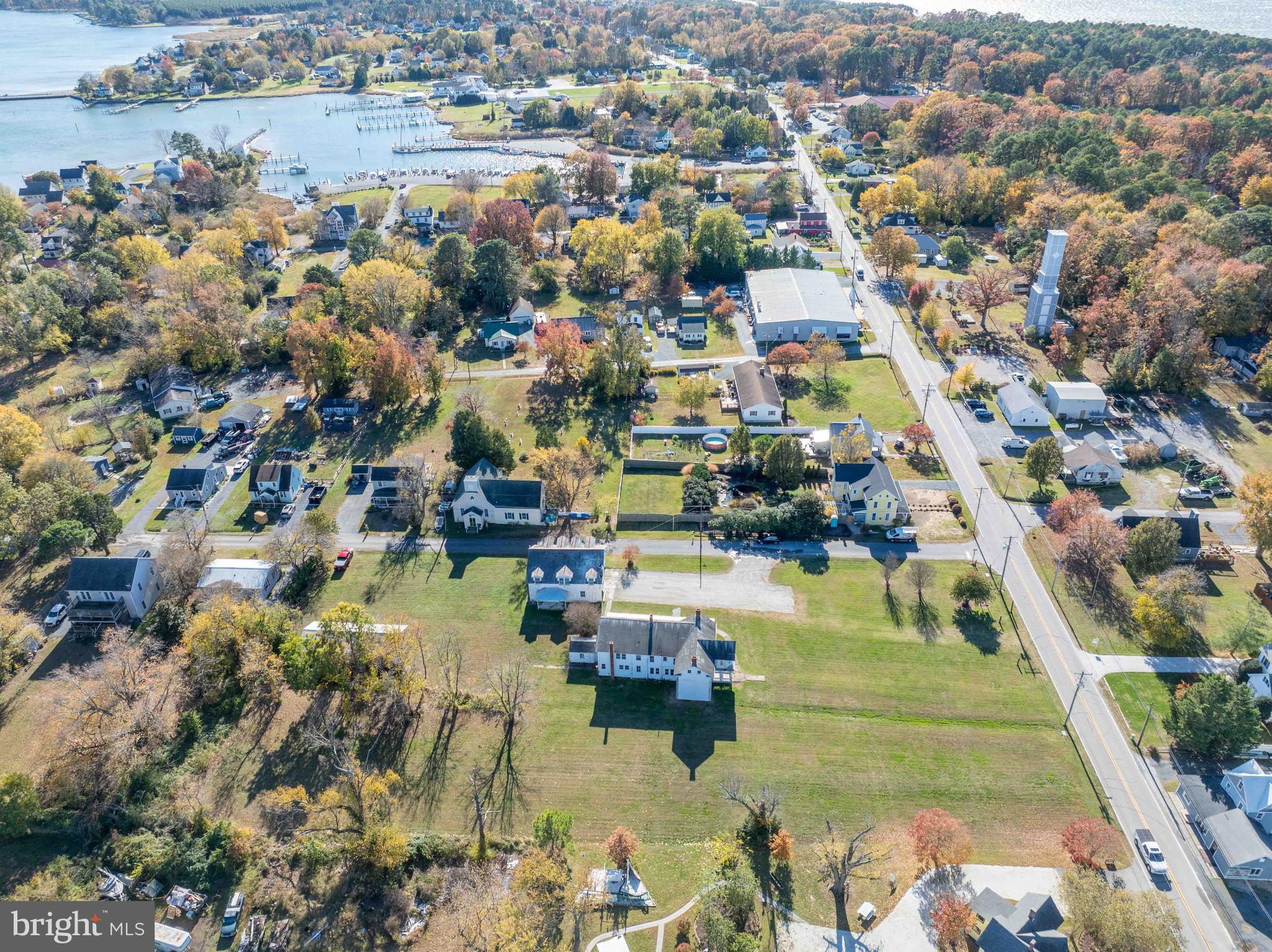 21486 Mission Road Tilghman, MD 21671 - Photo 30 of 32 an aerial view of residential houses with outdoor space