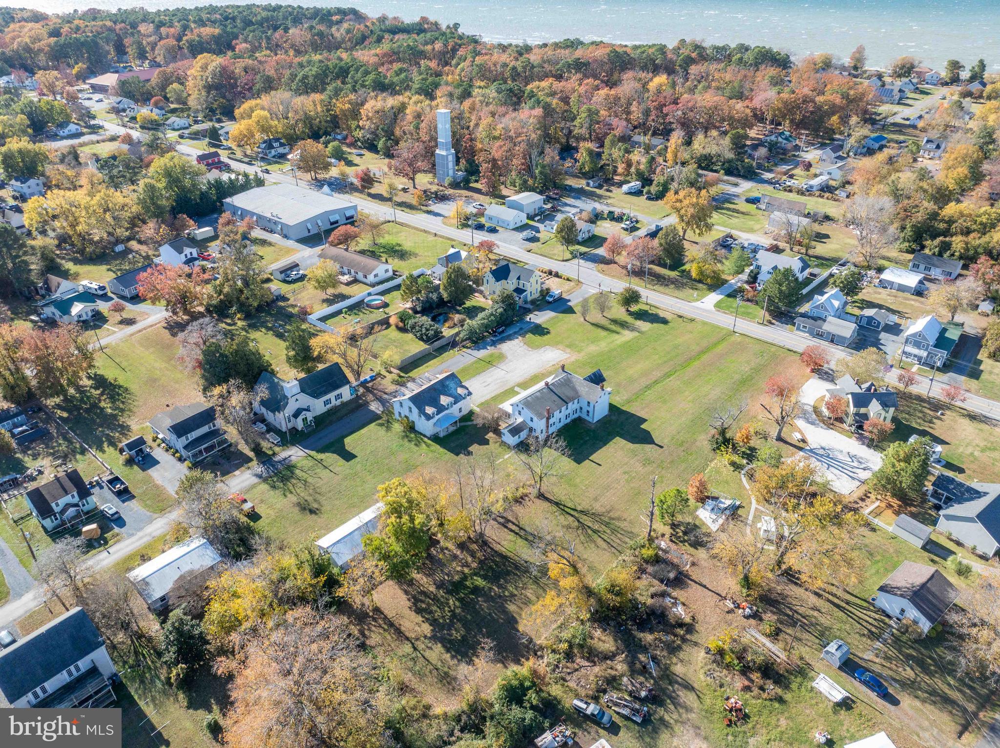 21486 Mission Road Tilghman, MD 21671 - Photo 32 of 32 an aerial view of residential houses with outdoor space