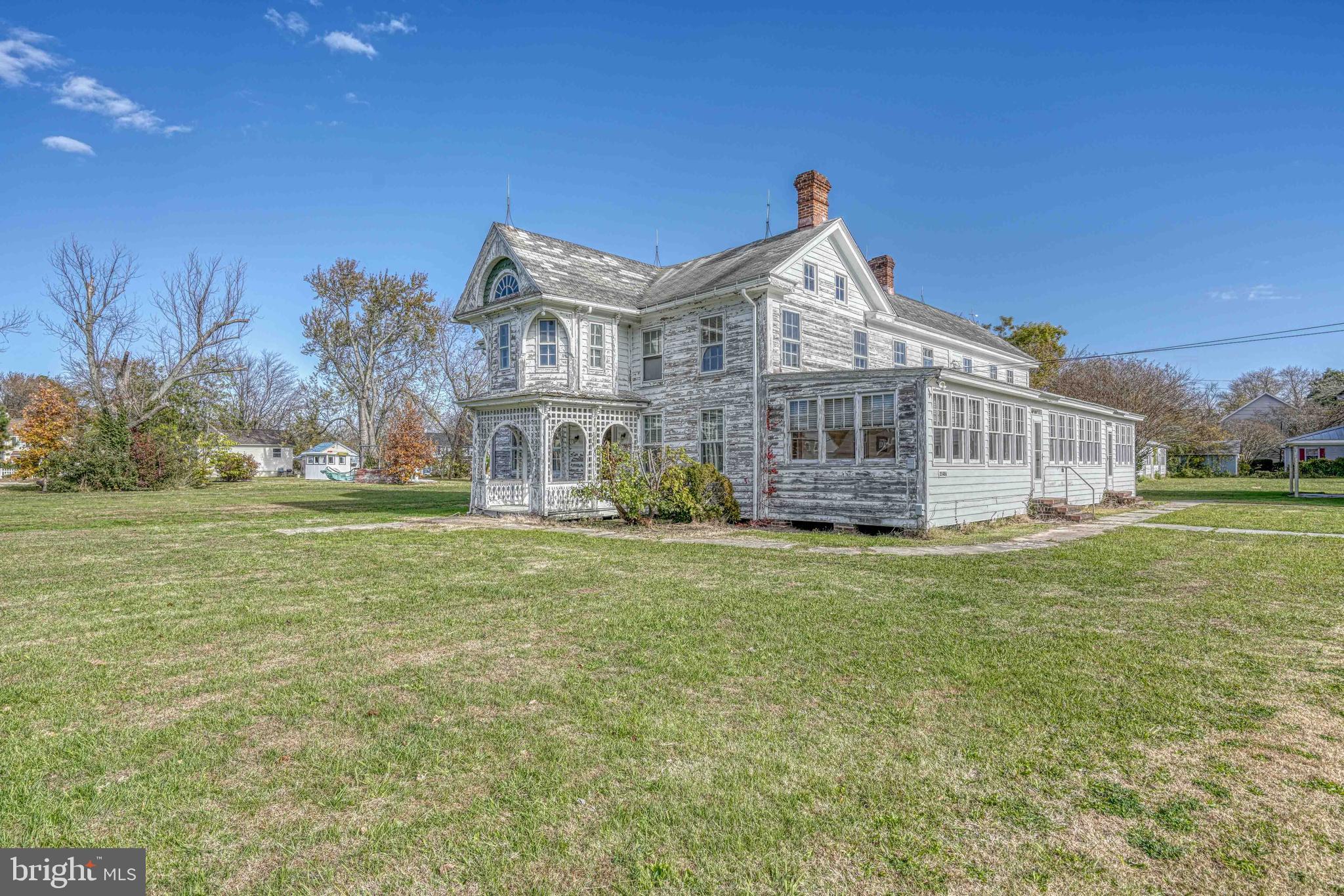 21486 Mission Road Tilghman, MD 21671 - Photo 4 of 32 a view of a house with a outdoor space