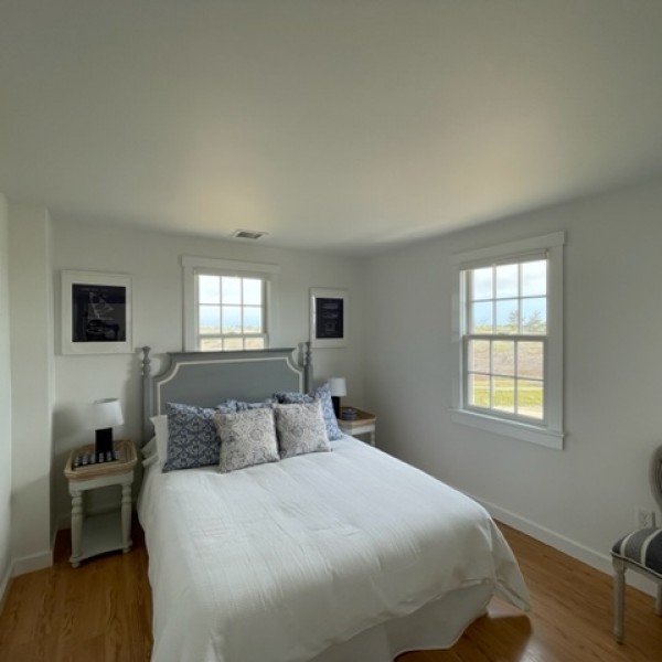 22 Sheep Pond Road Nantucket, MA 02554 - Photo 22 of 27 a bedroom with a bed and window