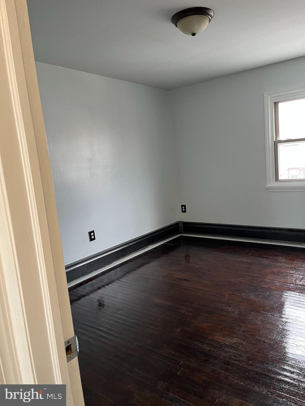 428 Croyden Road Upper Darby, PA 19082 - Photo 11 of 12 a view of empty room with wooden floor