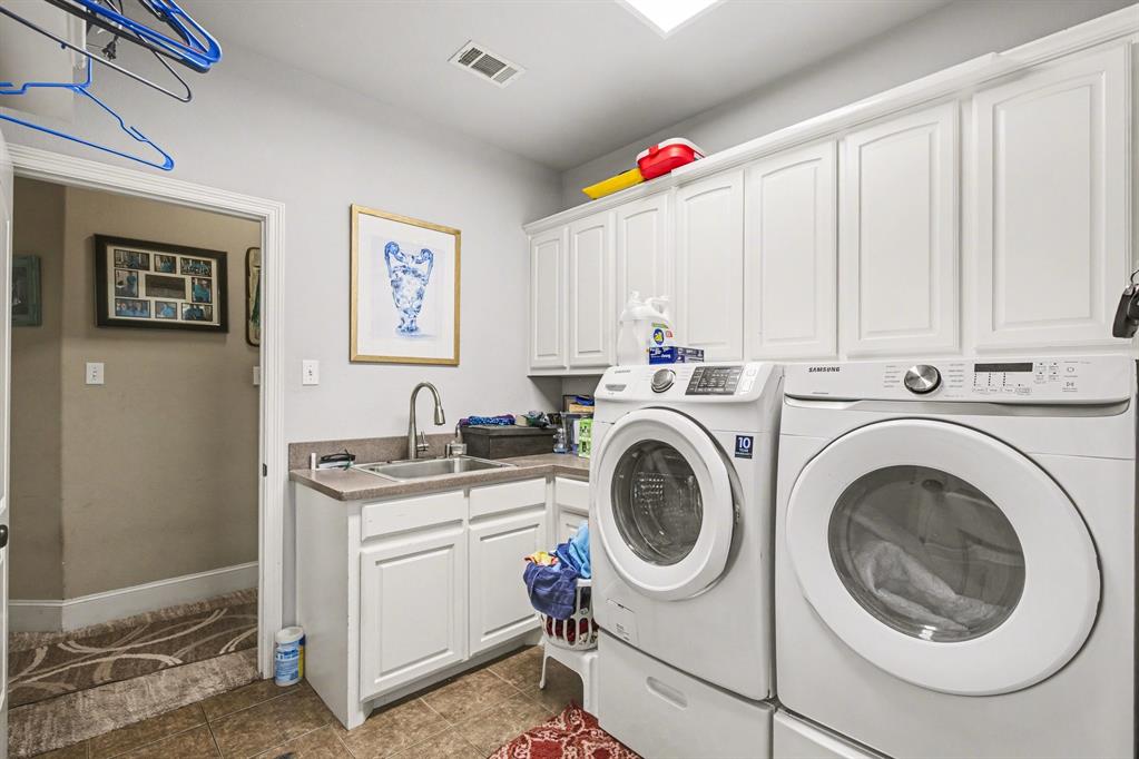 1361 Shallowbend Drive Midlothian, TX 76065 - Photo 13 of 30 a utility room with sink dryer and washer
