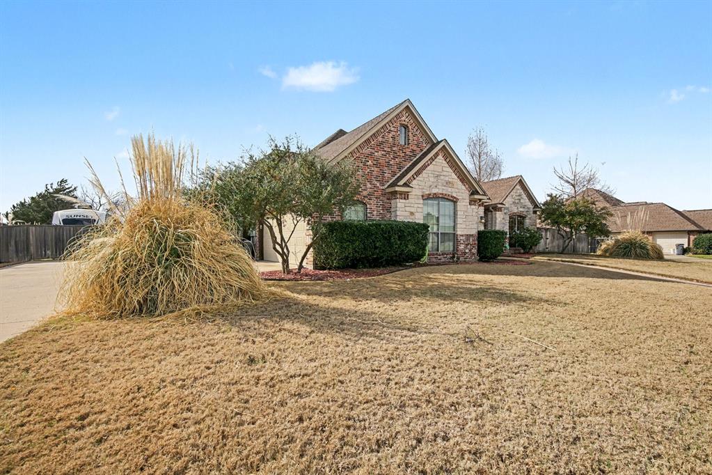 1361 Shallowbend Drive Midlothian, TX 76065 - Photo 2 of 30 a front view of a house with a yard