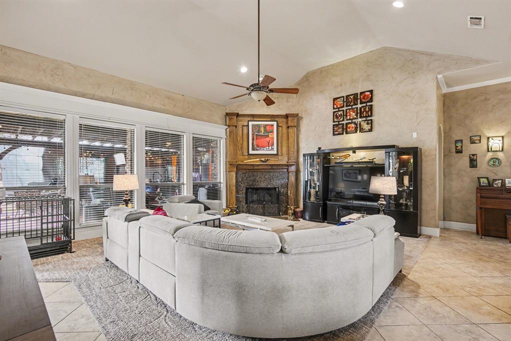 1361 Shallowbend Drive Midlothian, TX 76065 - Photo 8 of 30 a living room with fireplace furniture and a flat screen tv