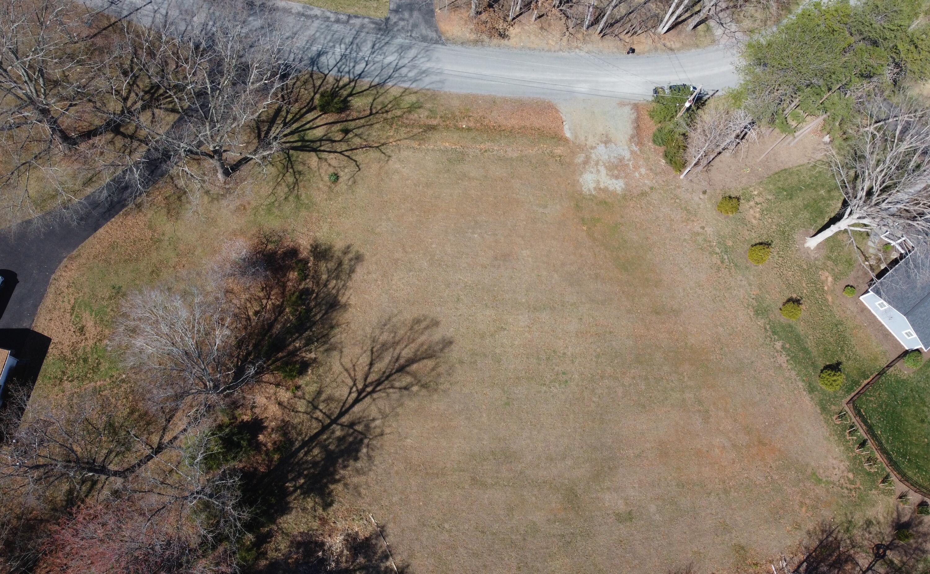 Lot 10 Highland Lake Rd Union Union Hall, VA 24176 - Photo 15 of 25 a view of a dry yard with wooden fence