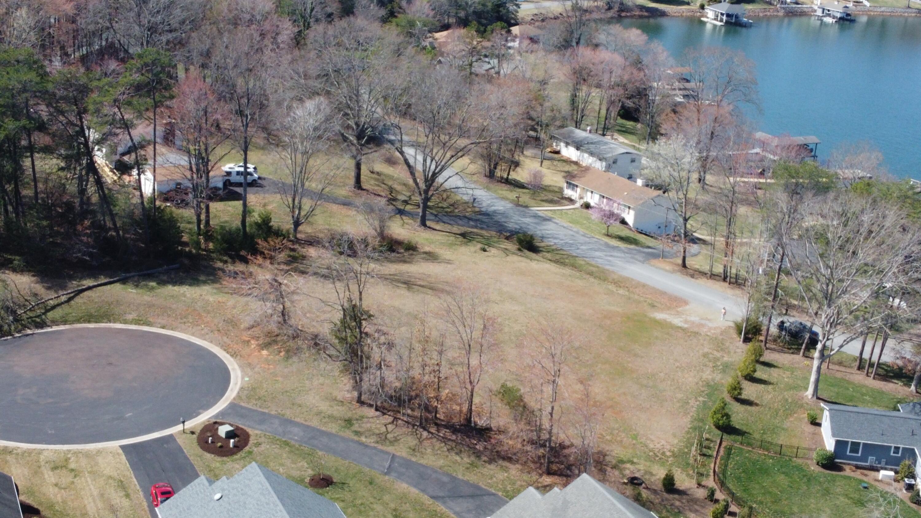Lot 10 Highland Lake Rd Union Union Hall, VA 24176 - Photo 4 of 25 a backyard of a house with outdoor seating