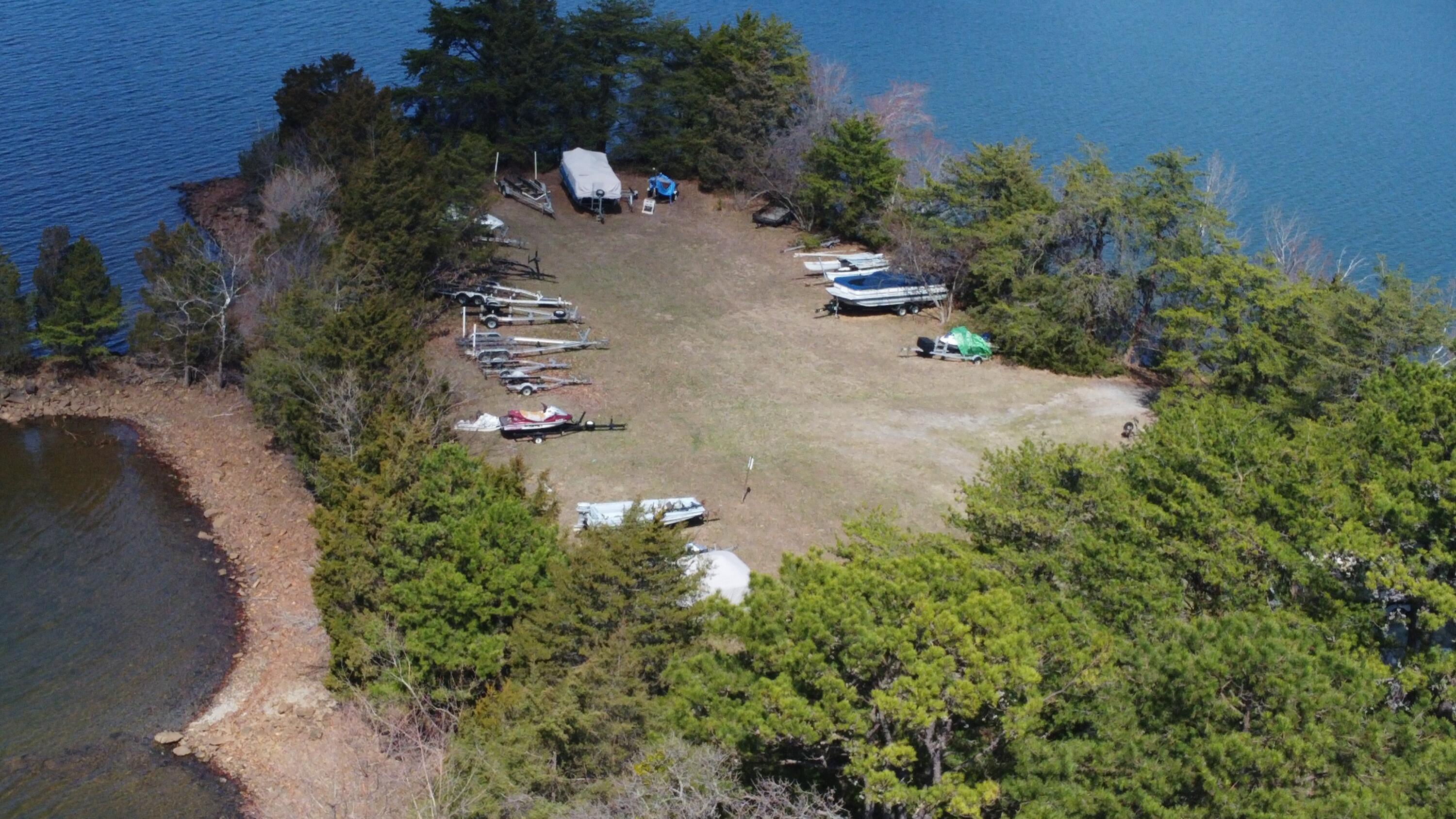 Lot 10 Highland Lake Rd Union Union Hall, VA 24176 - Photo 9 of 25 an aerial view of a house with a yard and trees all around