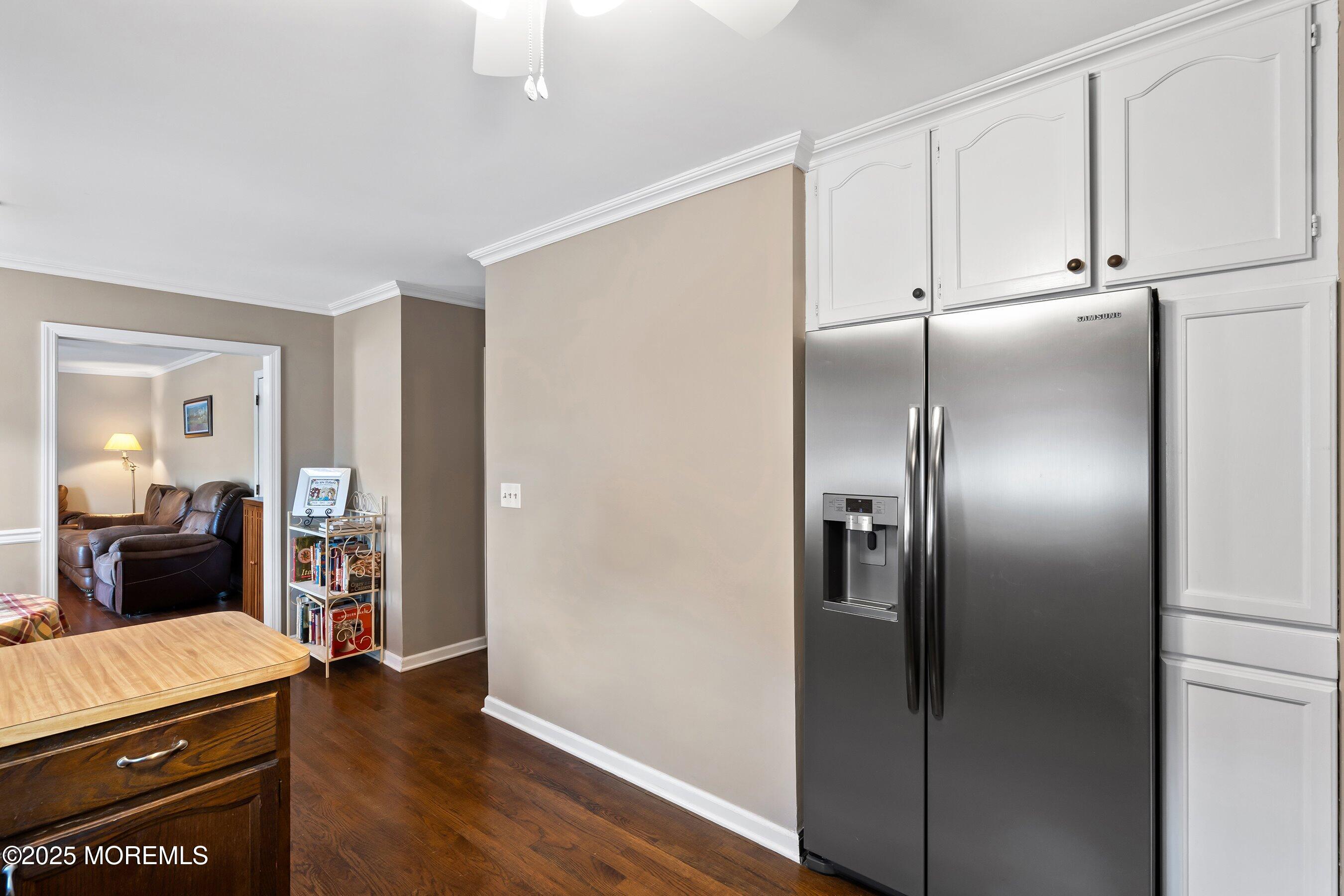 7 Spring Lake Avenue Oceanport, NJ 07757 - Photo 13 of 44 a view of a refrigerator in kitchen and wooden floor