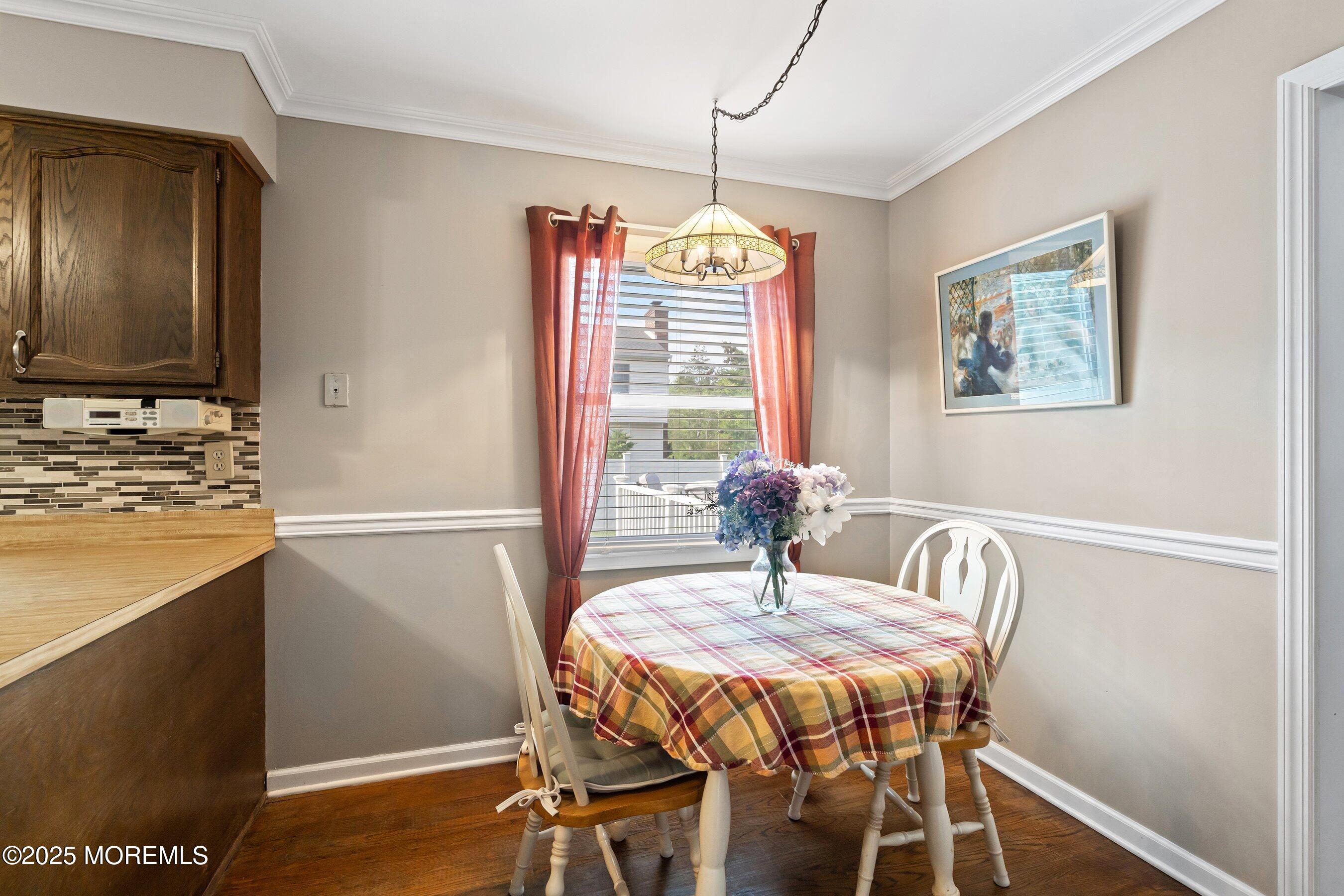 7 Spring Lake Avenue Oceanport, NJ 07757 - Photo 16 of 44 a view of a dining room with furniture window and wooden floor