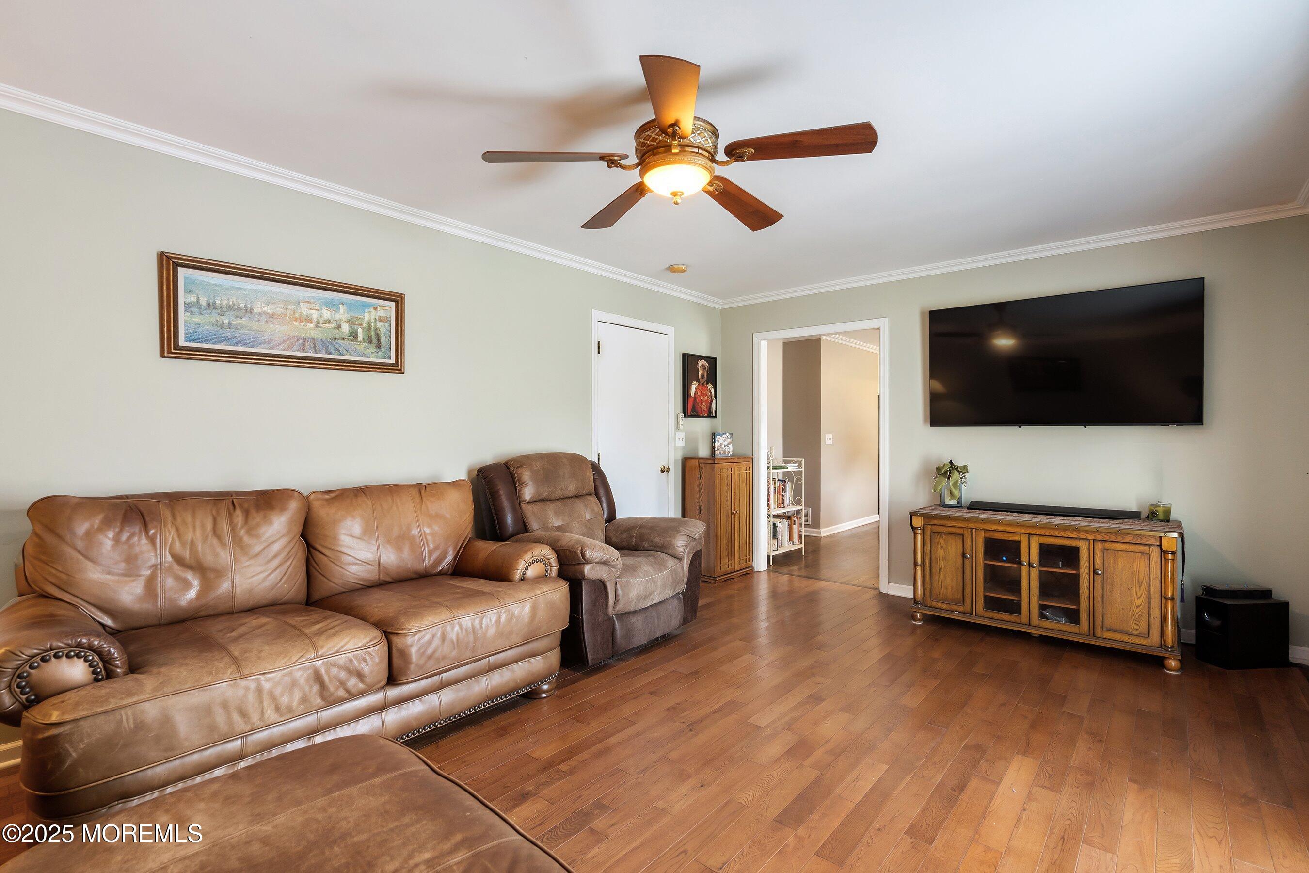 7 Spring Lake Avenue Oceanport, NJ 07757 - Photo 19 of 44 a living room with furniture and a flat screen tv