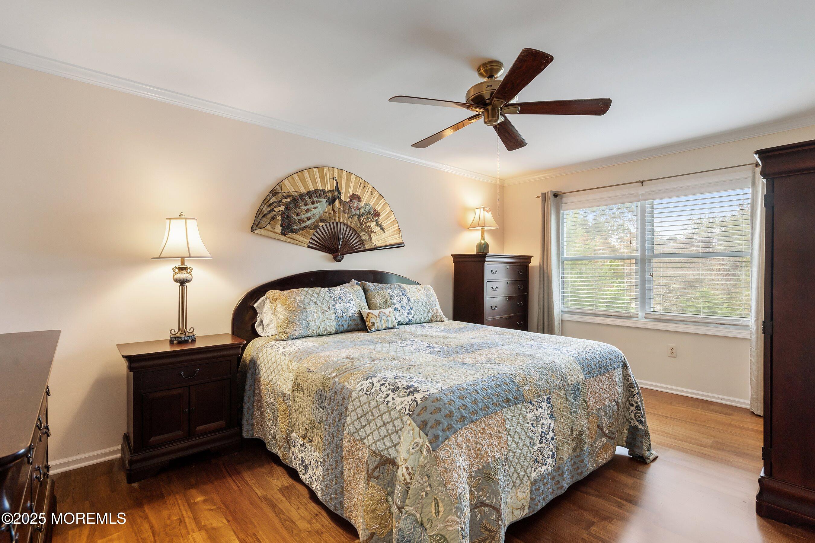 7 Spring Lake Avenue Oceanport, NJ 07757 - Photo 26 of 44 a bedroom with a bed and a window