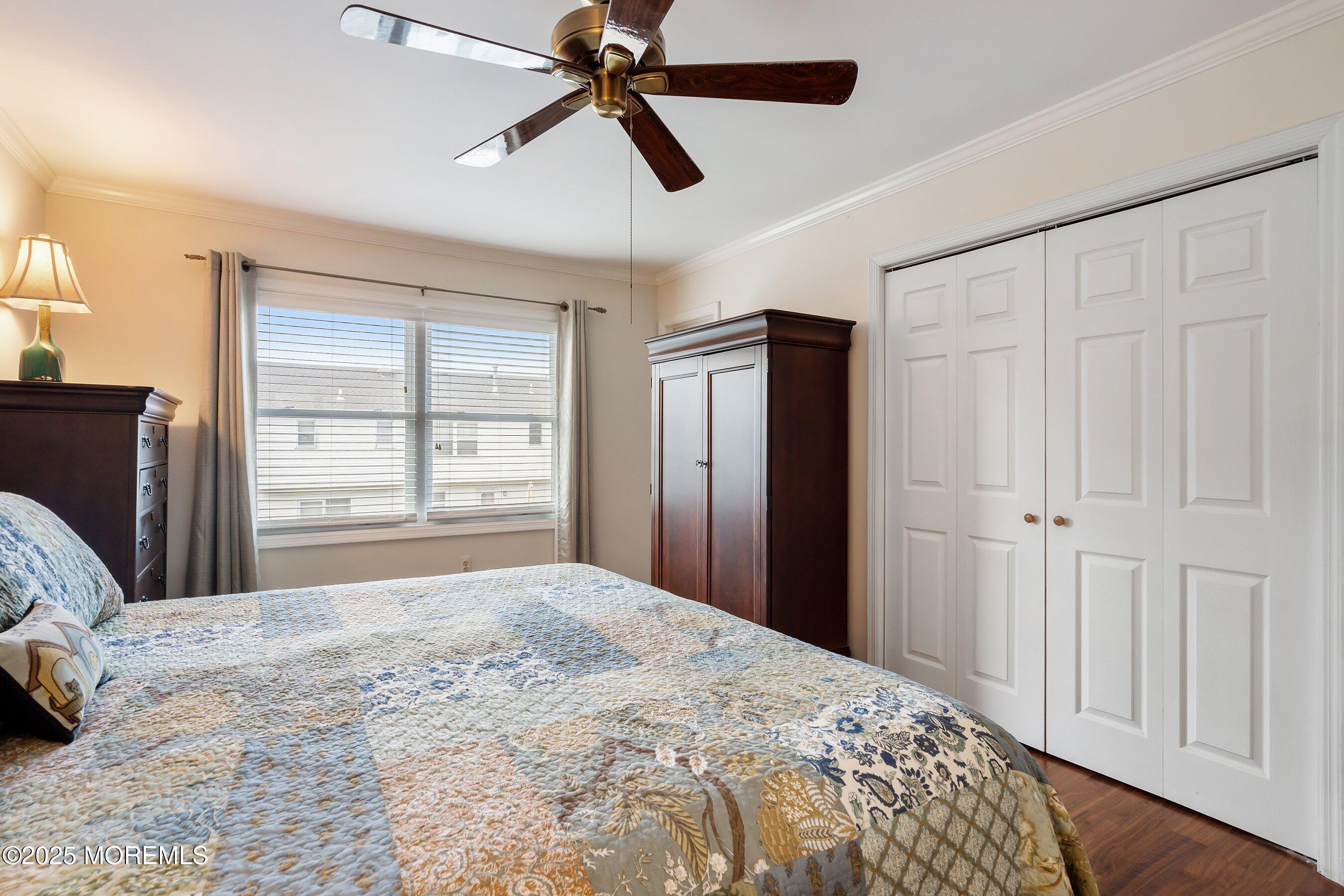 7 Spring Lake Avenue Oceanport, NJ 07757 - Photo 27 of 44 a bedroom with a bed and a window