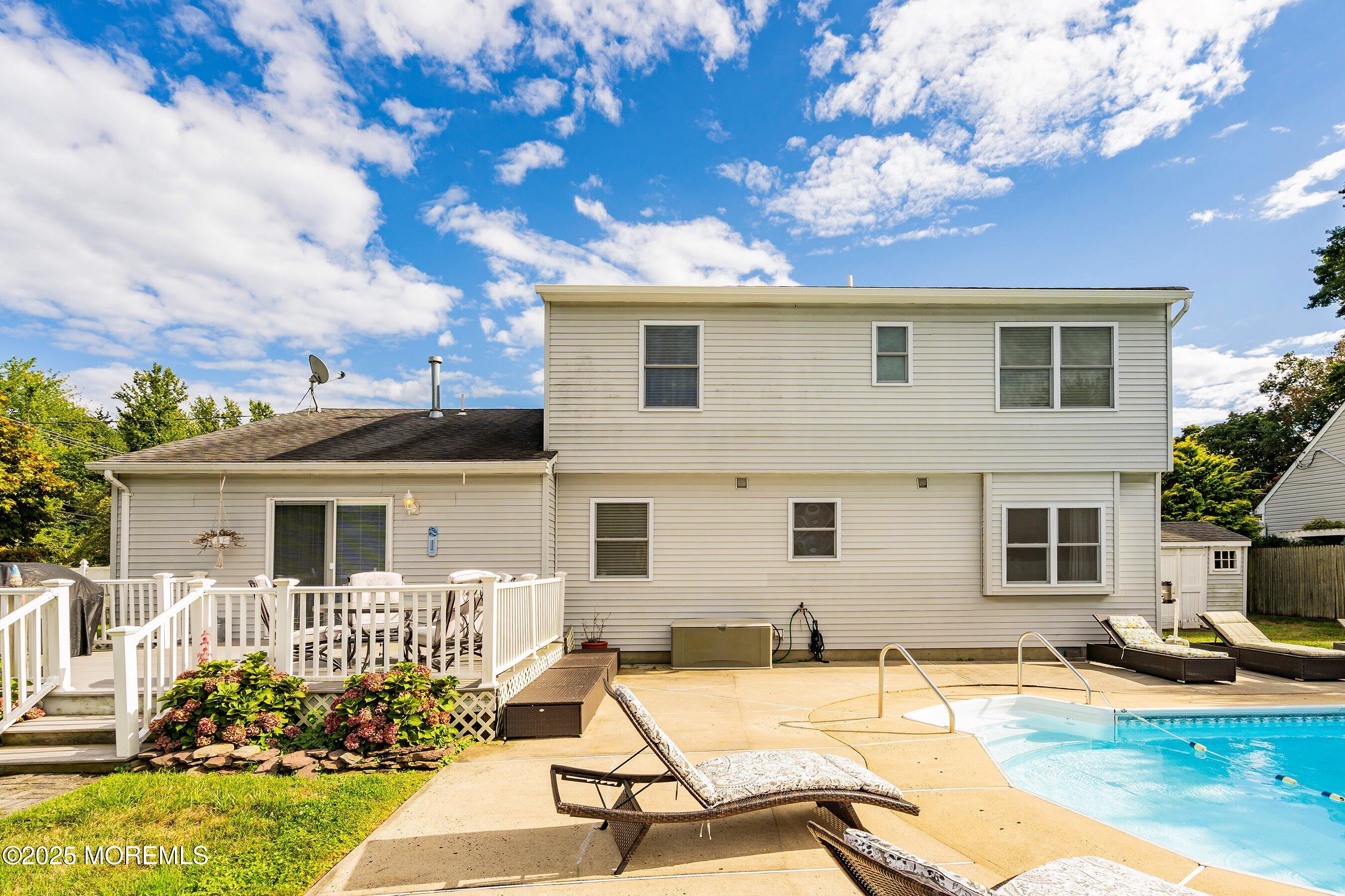 7 Spring Lake Avenue Oceanport, NJ 07757 - Photo 31 of 44 a view of a house with backyard and sitting area