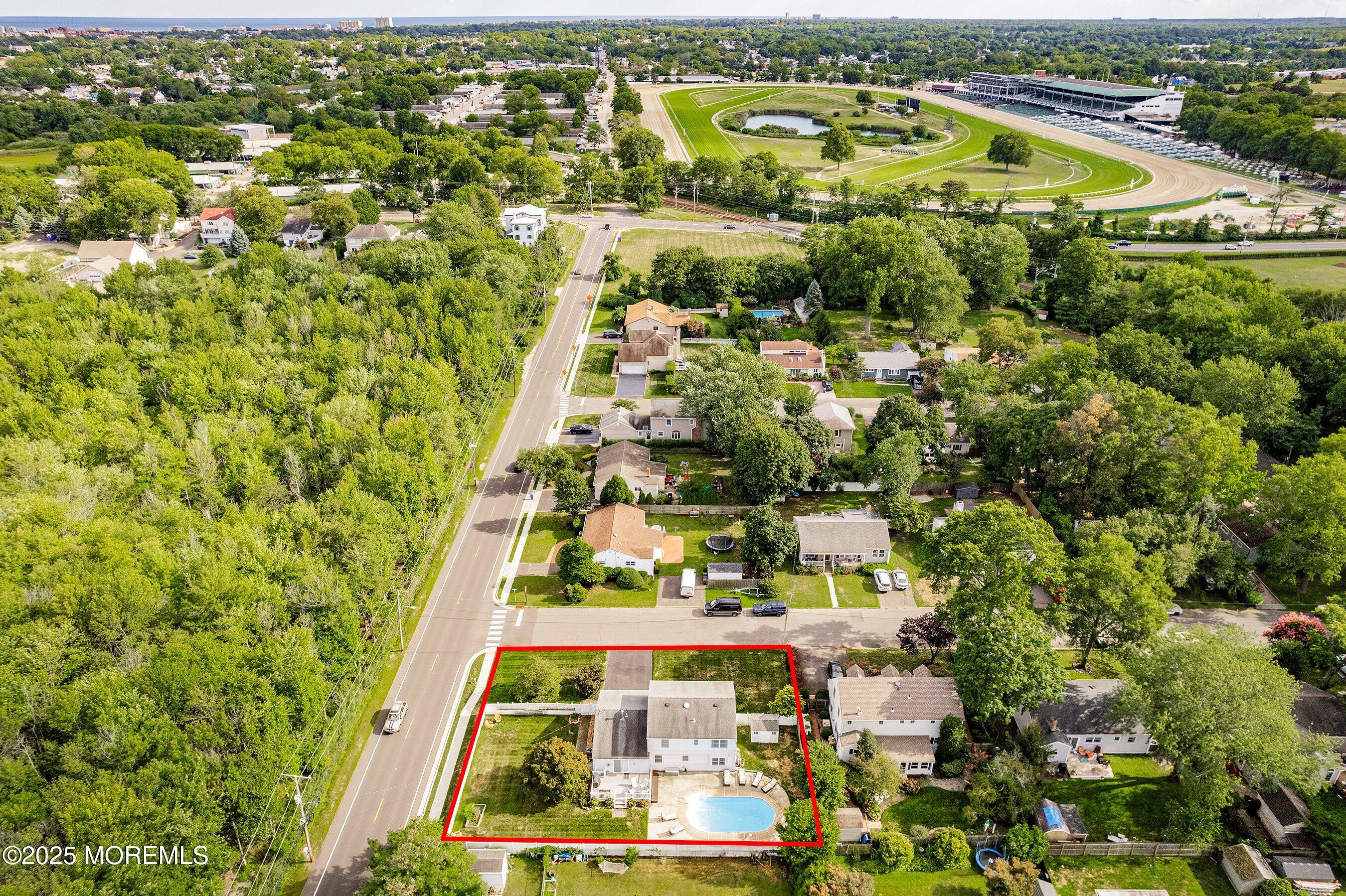 7 Spring Lake Avenue Oceanport, NJ 07757 - Photo 38 of 44 an aerial view of residential houses with outdoor space and trees