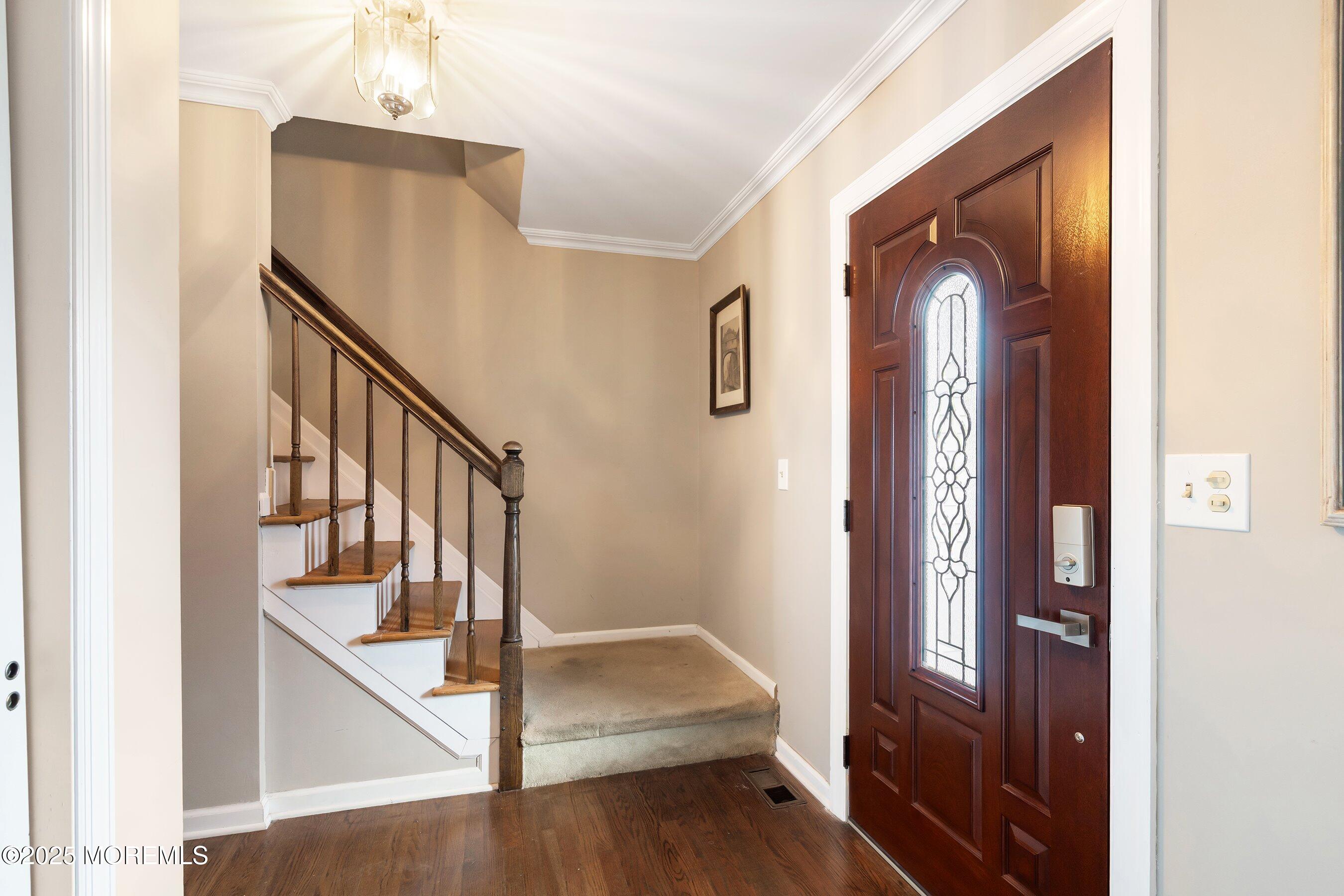 7 Spring Lake Avenue Oceanport, NJ 07757 - Photo 4 of 44 a view of entryway and hall with wooden floor