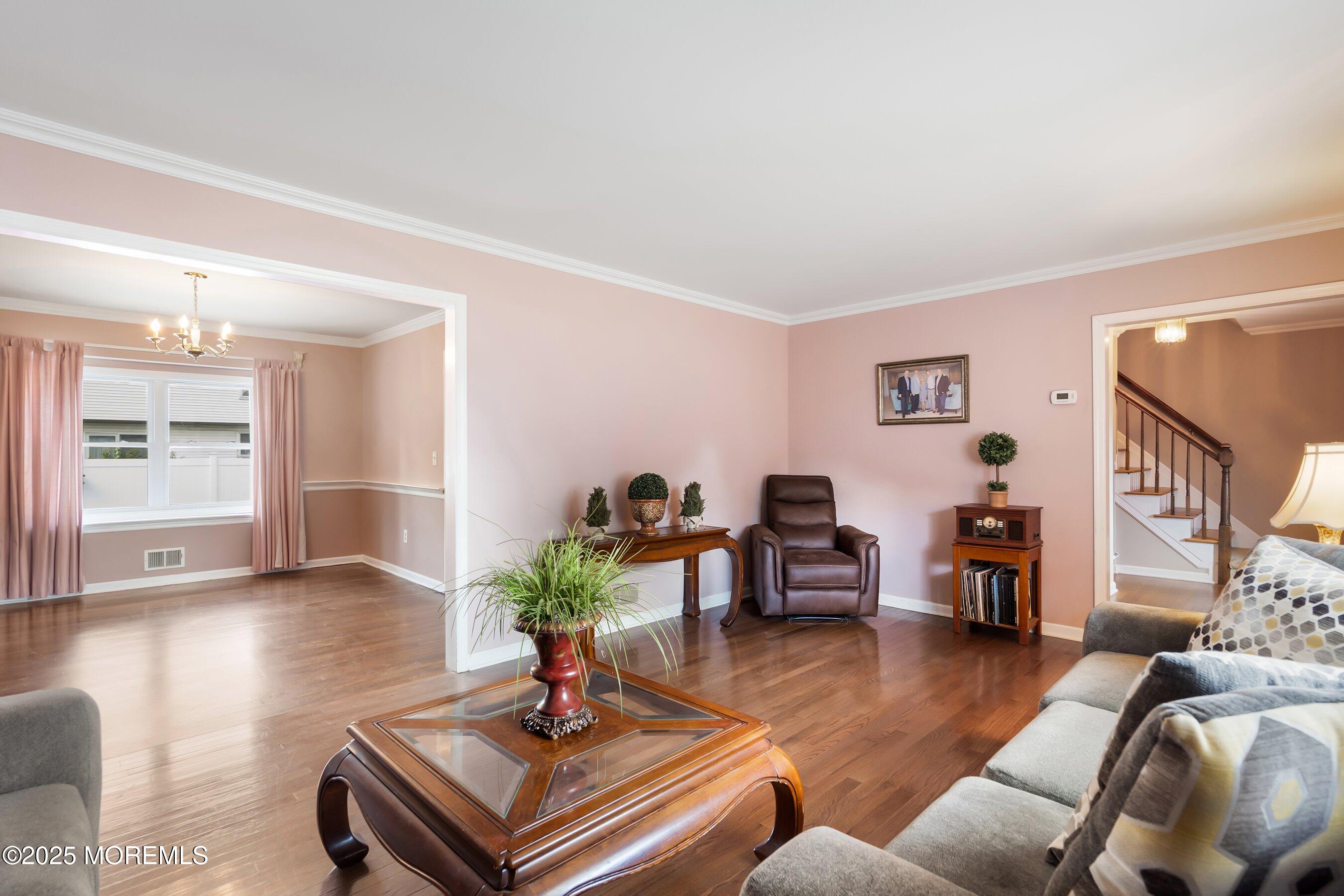 7 Spring Lake Avenue Oceanport, NJ 07757 - Photo 7 of 44 a living room with furniture and a wooden floor