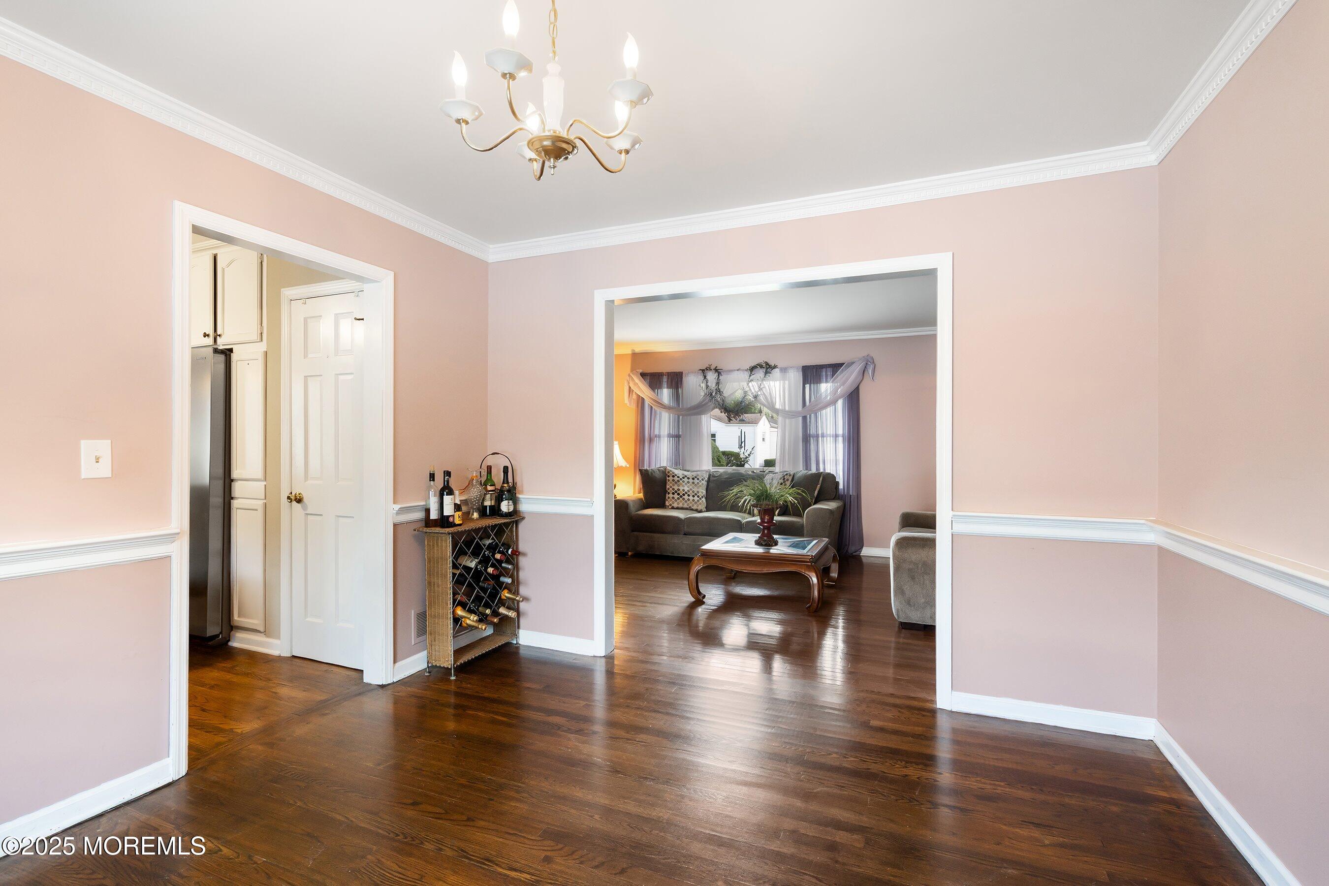 7 Spring Lake Avenue Oceanport, NJ 07757 - Photo 8 of 44 a view of a livingroom with furniture hardwood floor and a ceiling fan