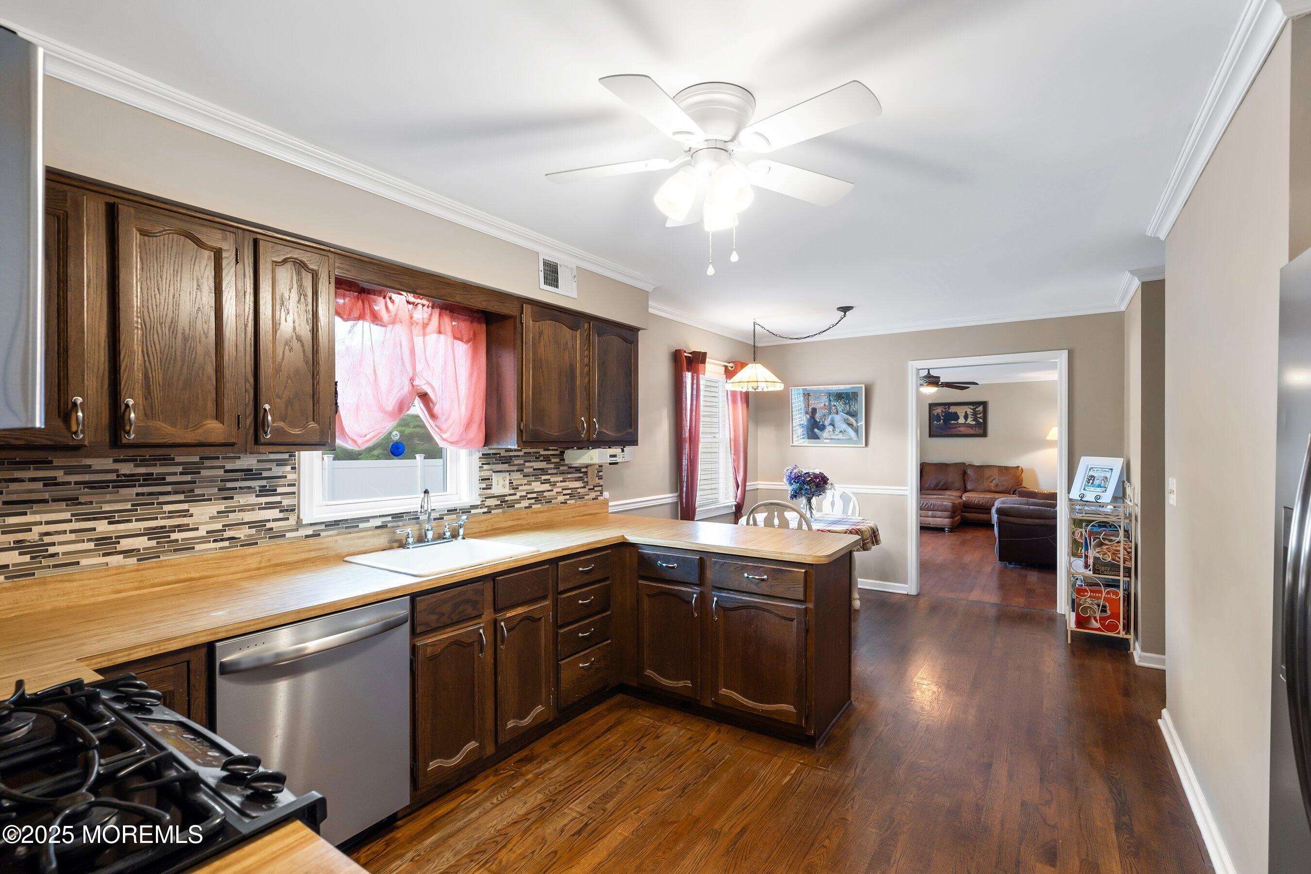 7 Spring Lake Avenue Oceanport, NJ 07757 - Photo 10 of 44 a kitchen with lots of counter top space and a sink