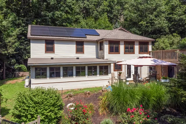 a aerial view of a house with a garden