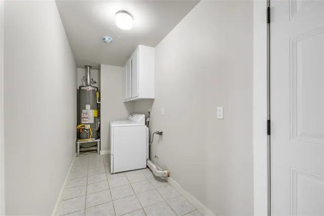 a view of a storage & utility room with washer and dryer