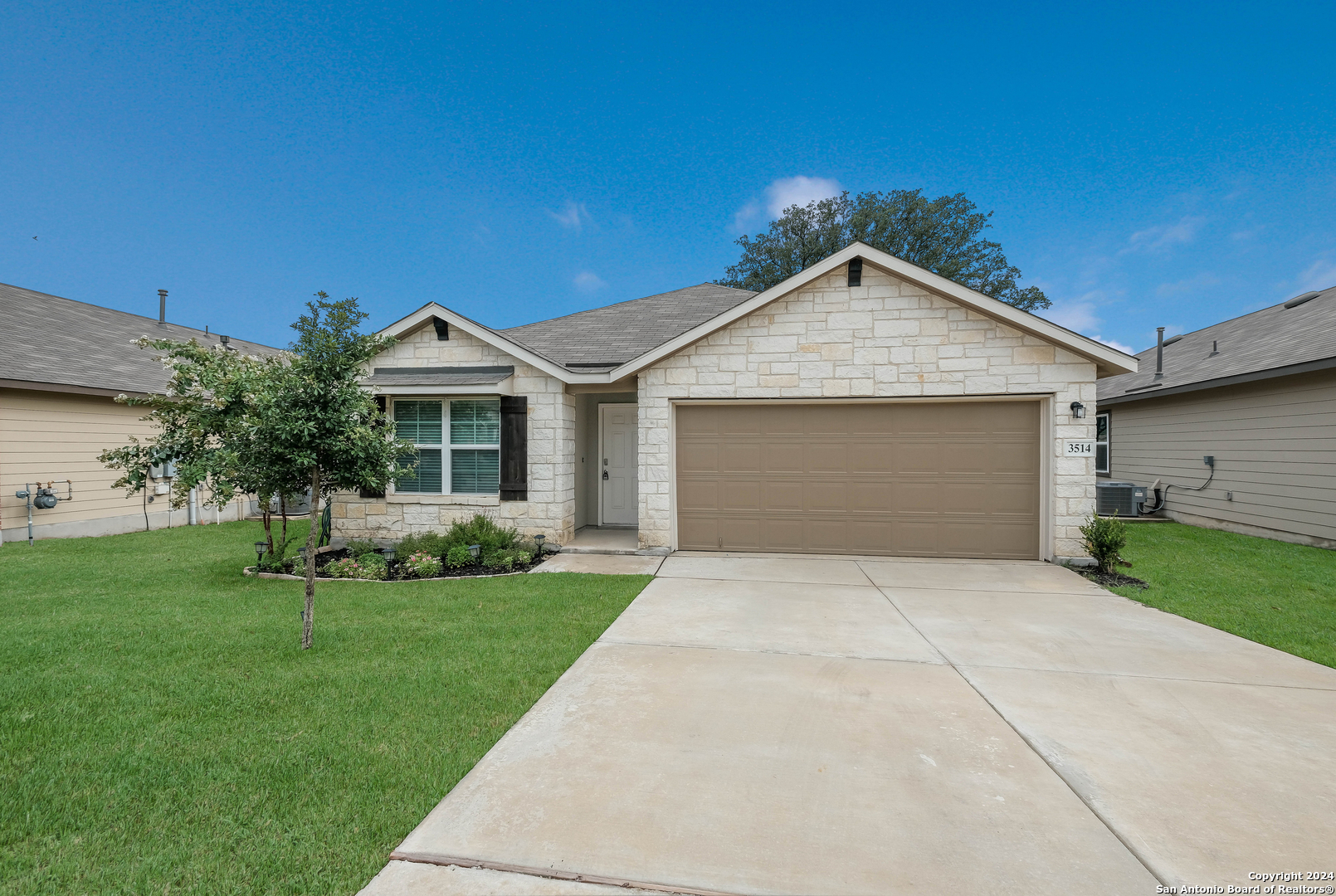 3514 Copper River Bulverde, TX 78163 - Photo 1 of 1 a front view of a house with a yard and garage