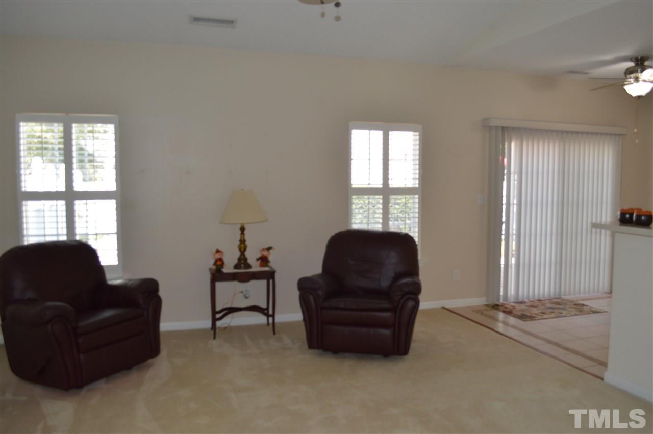 8508 Neuse Garden Drive Raleigh, NC 27616 - Photo 11 of 30 a living room with furniture and a window
