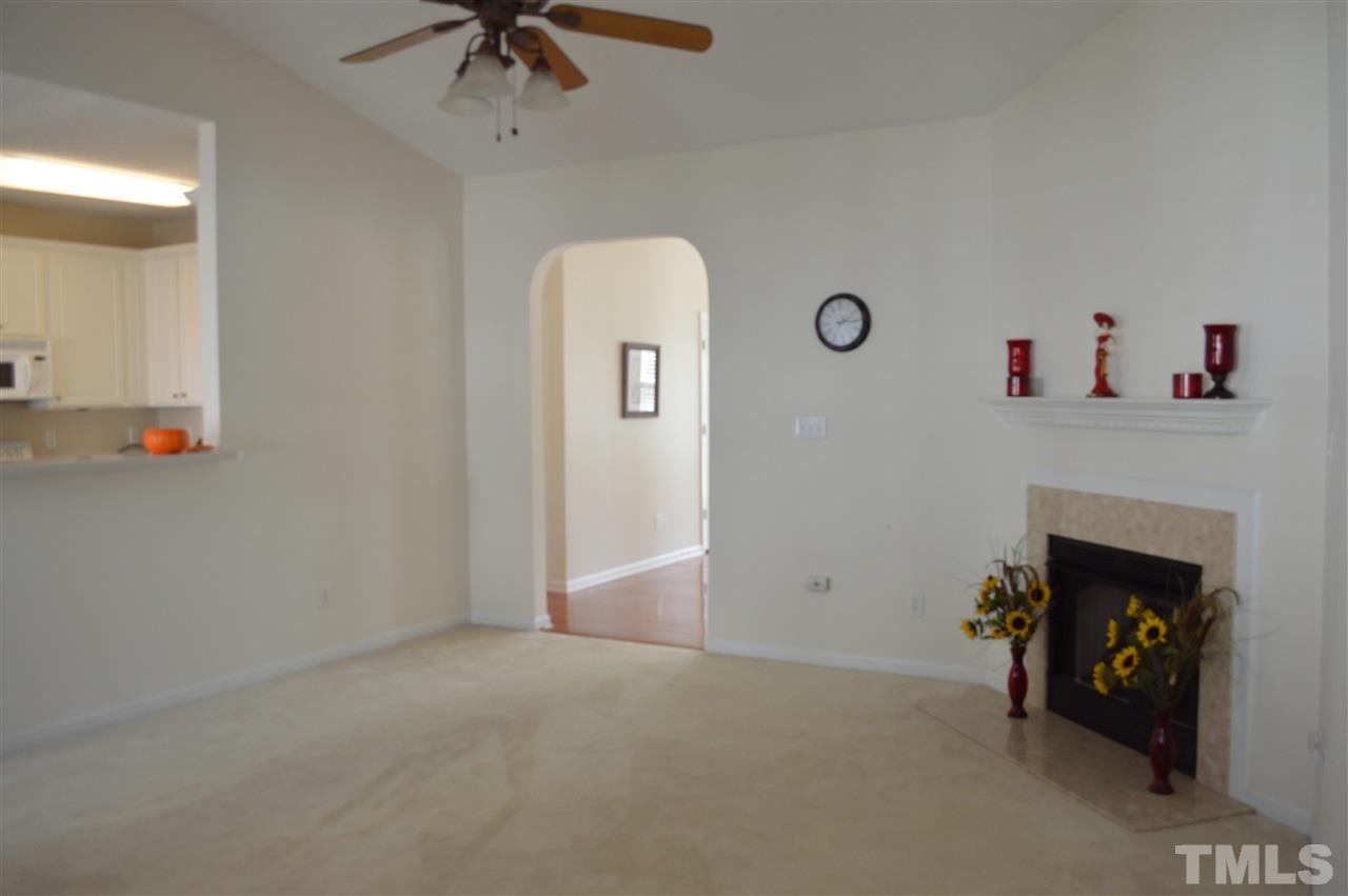 8508 Neuse Garden Drive Raleigh, NC 27616 - Photo 12 of 30 a view of livingroom with furniture and a fireplace