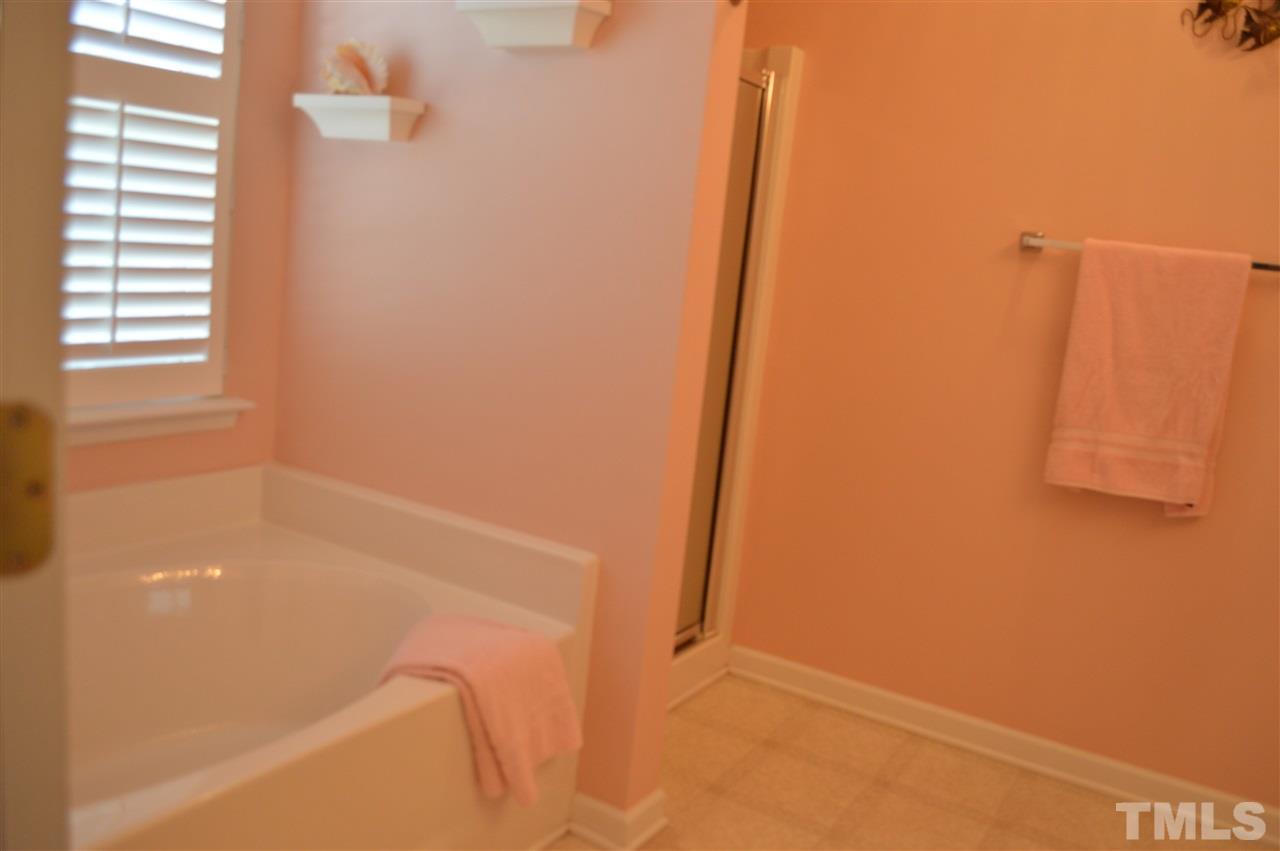 8508 Neuse Garden Drive Raleigh, NC 27616 - Photo 19 of 30 a bathroom with a bathtub