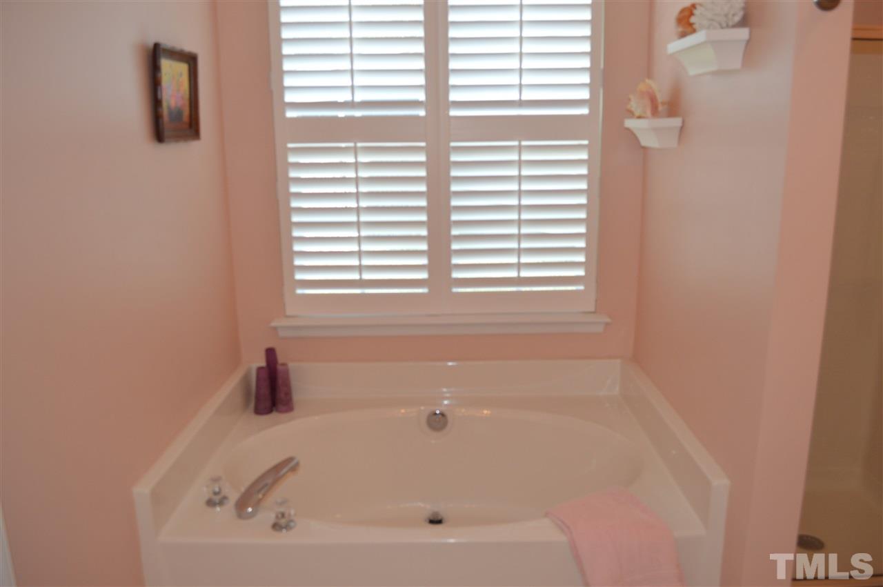 8508 Neuse Garden Drive Raleigh, NC 27616 - Photo 20 of 30 a bathroom with a bathtub