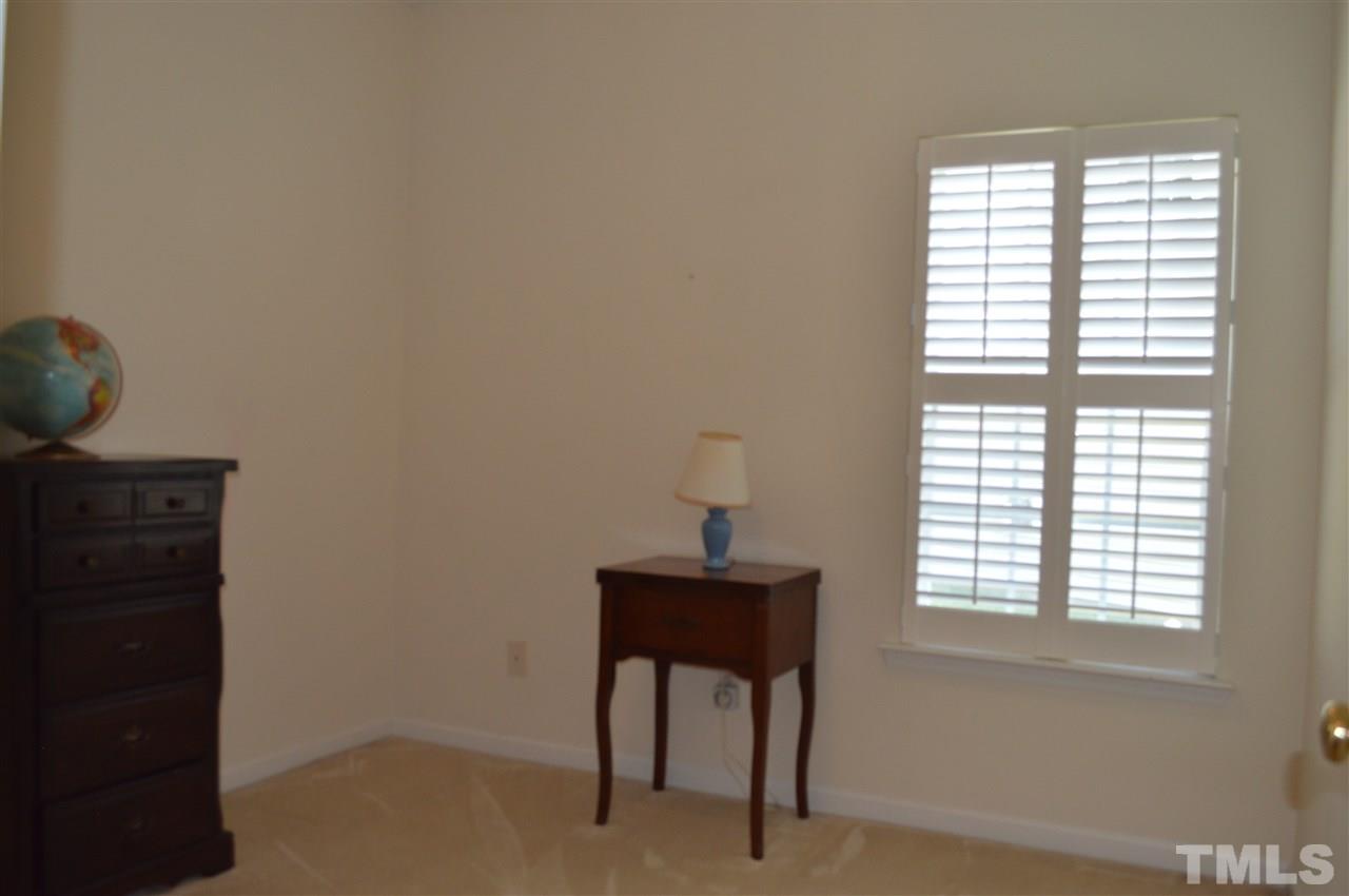 8508 Neuse Garden Drive Raleigh, NC 27616 - Photo 25 of 30 a view of a workspace room with a window