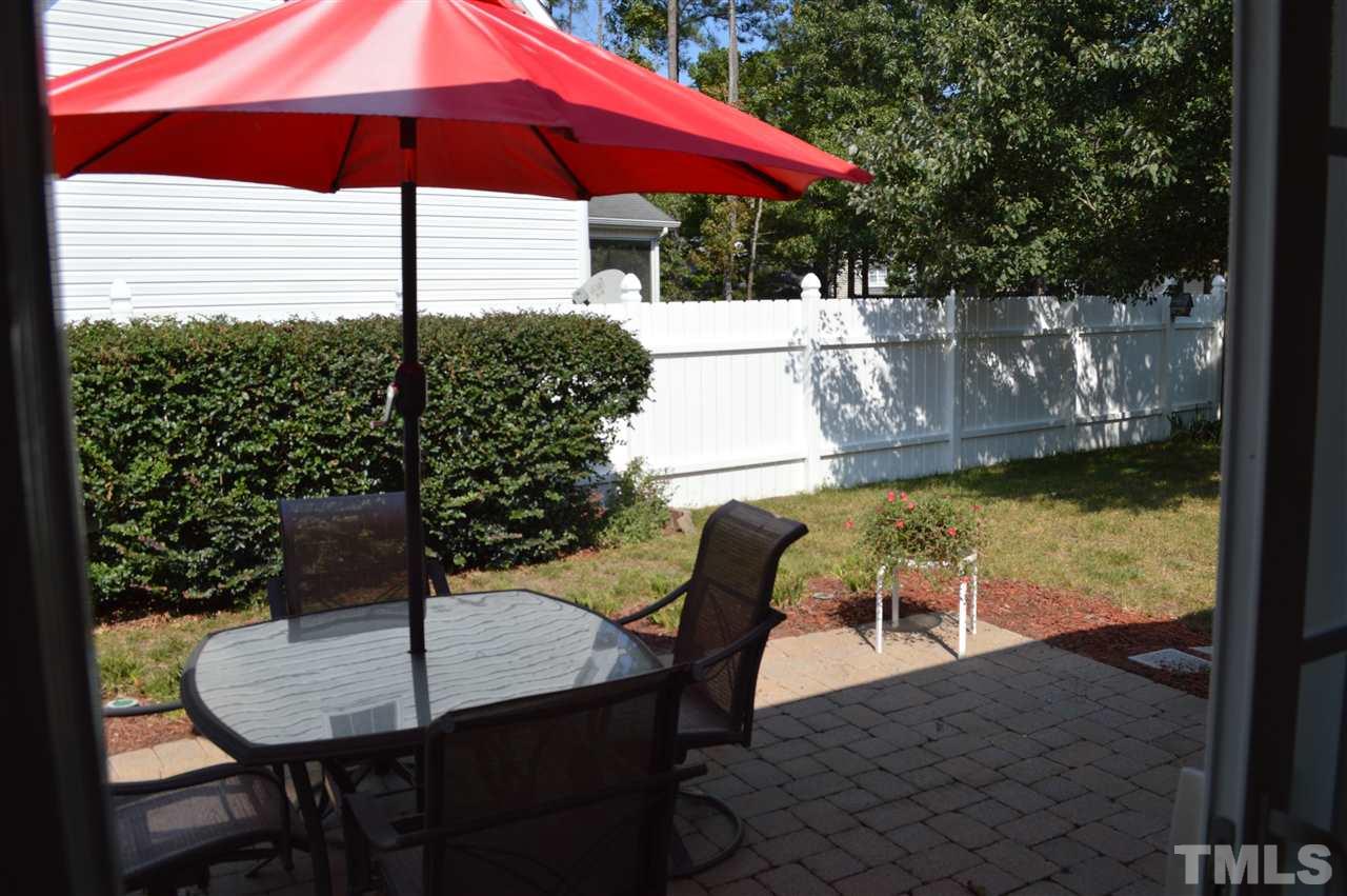8508 Neuse Garden Drive Raleigh, NC 27616 - Photo 27 of 30 a view of a chair and table on the patio