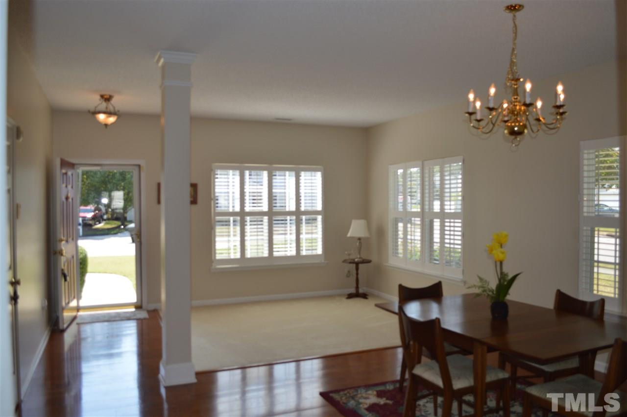 8508 Neuse Garden Drive Raleigh, NC 27616 - Photo 5 of 30 a view of a dining room with furniture and window