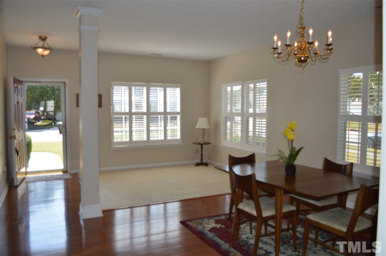 8508 Neuse Garden Drive Raleigh, NC 27616 - Photo 6 of 30 a view of a dining room with furniture and window