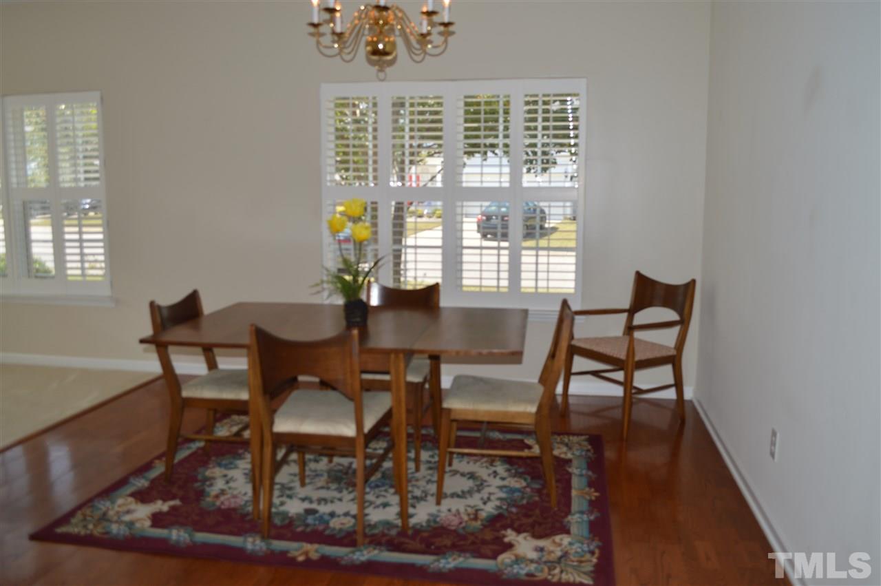 8508 Neuse Garden Drive Raleigh, NC 27616 - Photo 7 of 30 a dining room with furniture and window