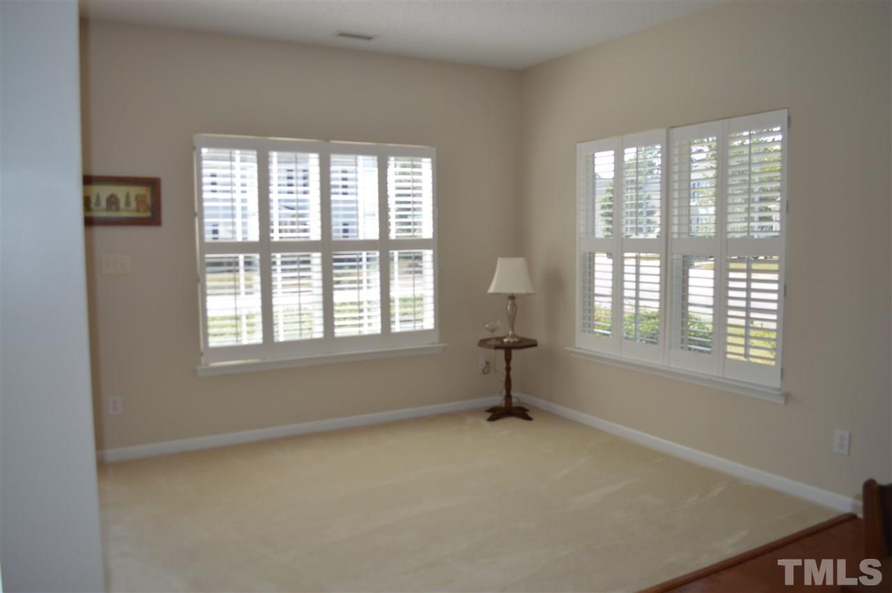 8508 Neuse Garden Drive Raleigh, NC 27616 - Photo 8 of 30 an empty room with windows