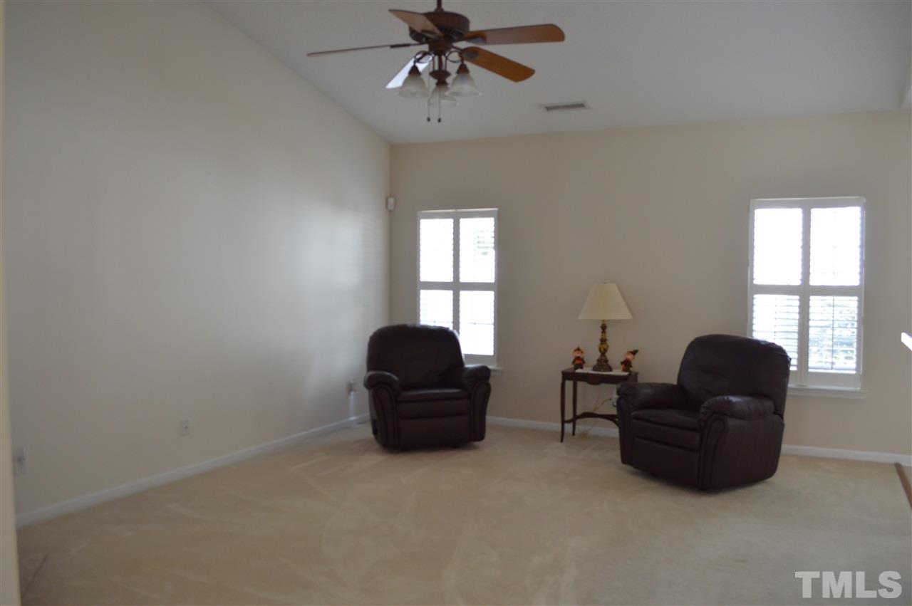 8508 Neuse Garden Drive Raleigh, NC 27616 - Photo 9 of 30 a living room with furniture and a window