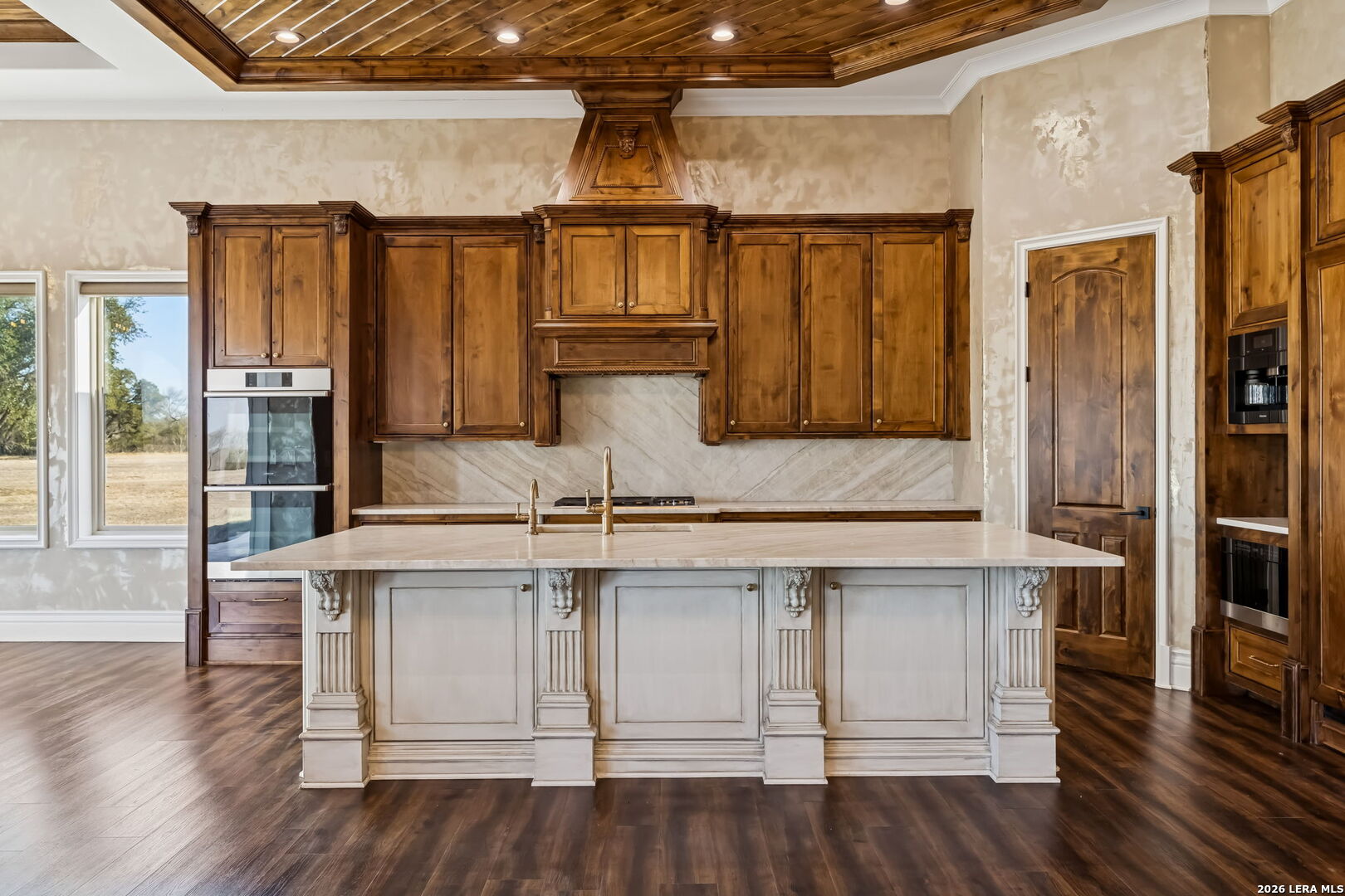 3128 Old St Marys Road Beeville, TX 78102 - Photo 15 of 50 a white kitchen with a sink and cabinets