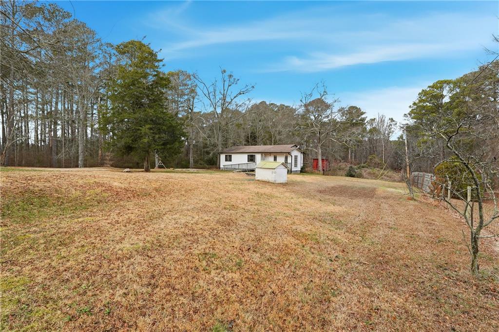 5685 Ashland Farm Road Oxford, GA 30054 - Photo 12 of 25 a view of lake with trees