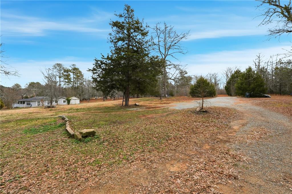5685 Ashland Farm Road Oxford, GA 30054 - Photo 14 of 25 a view of a park with large trees