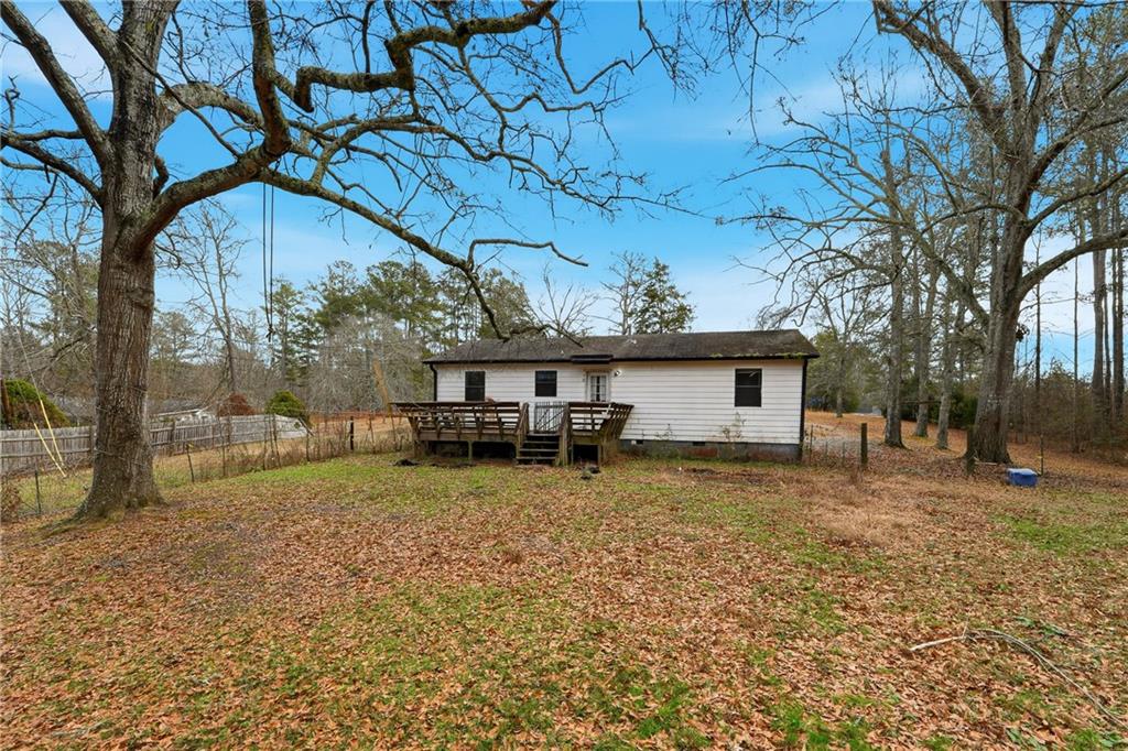 5685 Ashland Farm Road Oxford, GA 30054 - Photo 23 of 25 a view of a house with a yard