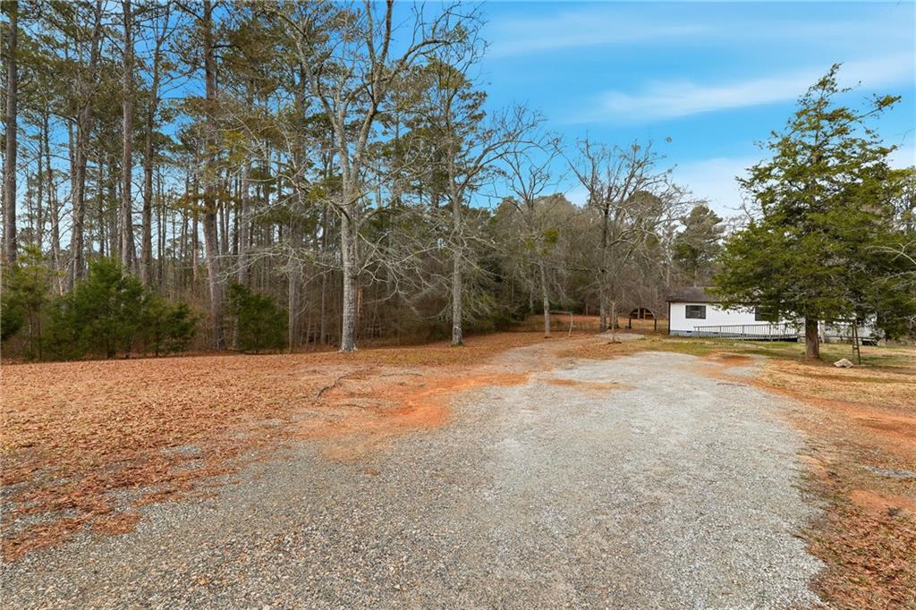 5685 Ashland Farm Road Oxford, GA 30054 - Photo 10 of 25 a view of outdoor space with trees all around