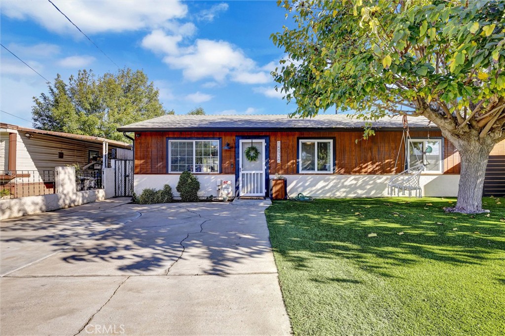 15936 Dauchy Avenue Riverside, CA 92508 - Photo 4 of 25 a front view of a house with garden