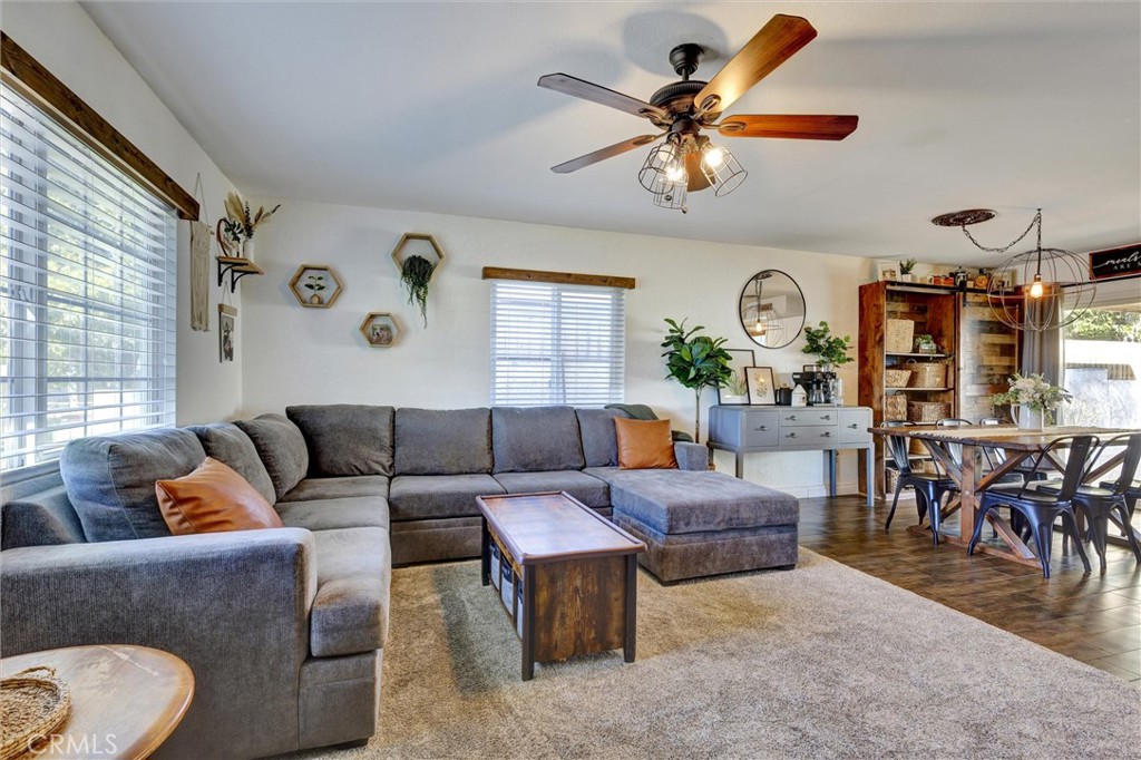15936 Dauchy Avenue Riverside, CA 92508 - Photo 5 of 25 a living room with furniture and wooden floor