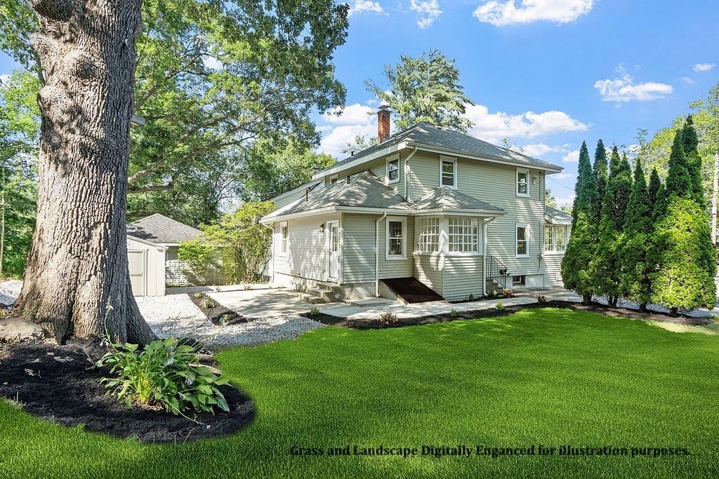 12 Romola Road Worcester, MA 01609 - Photo 4 of 33 a front view of a house with garden