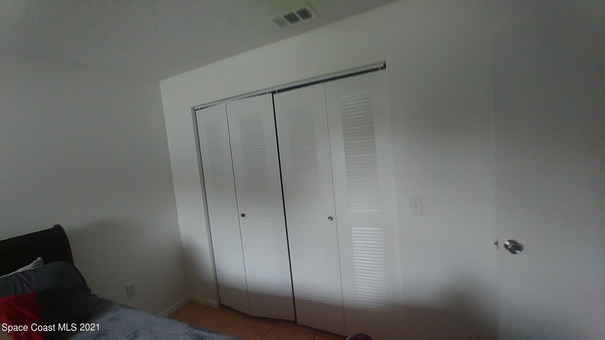 604 Ridge Club Drive, Unit 96 Melbourne, FL 32934 - Photo 16 of 17 a view of closet area