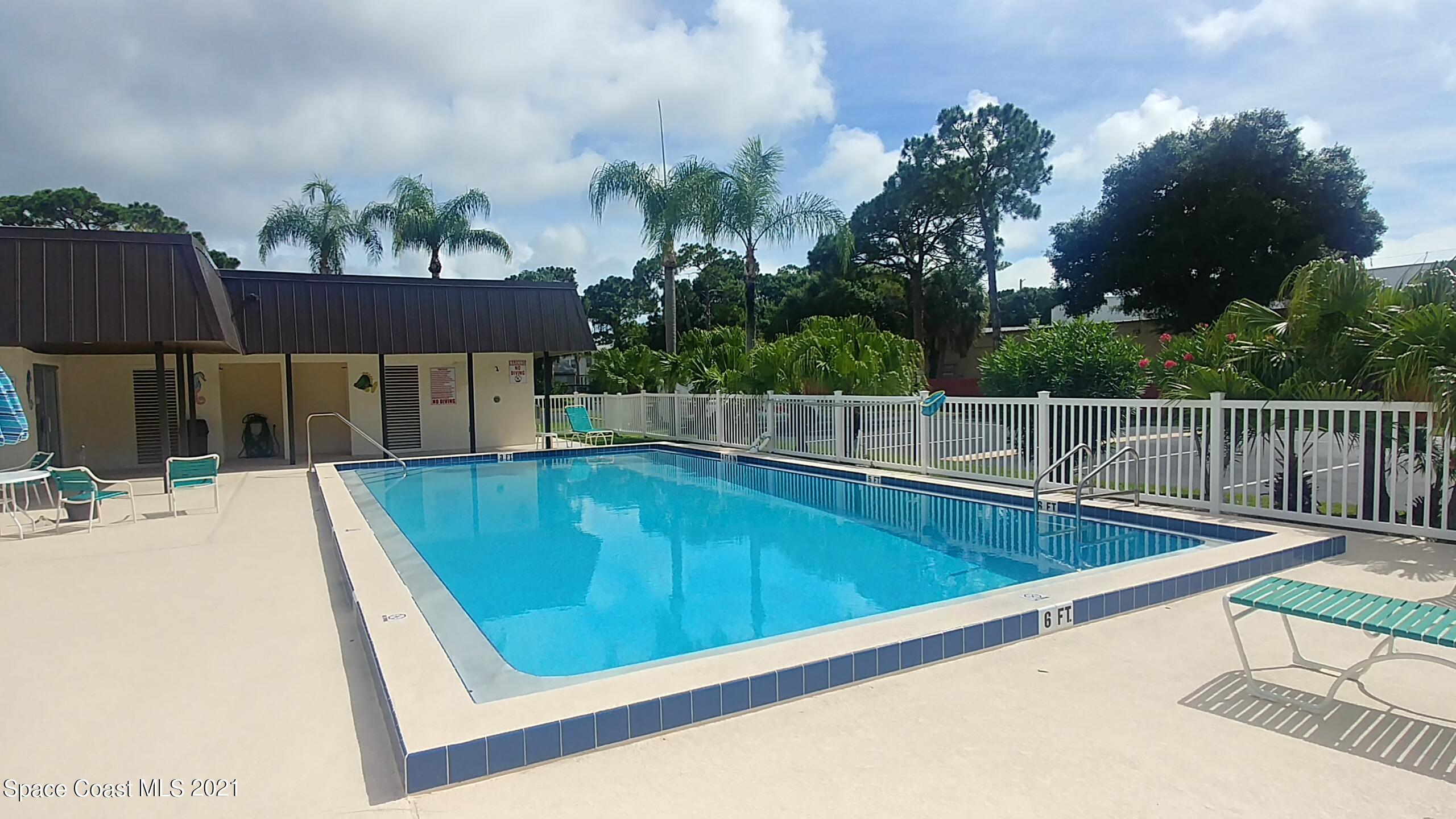 604 Ridge Club Drive, Unit 96 Melbourne, FL 32934 - Photo 3 of 17 swimming pool view with a seating space