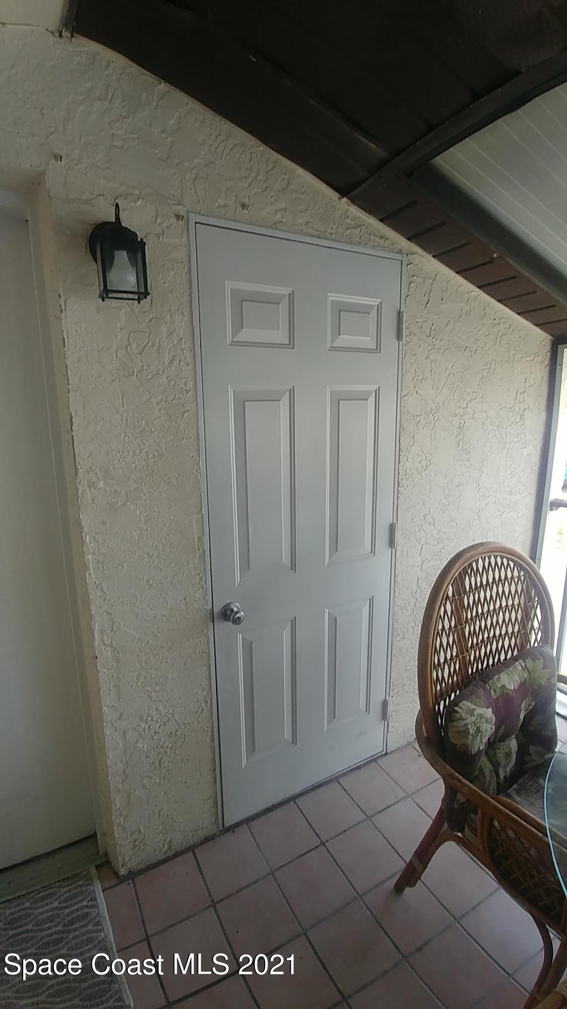 604 Ridge Club Drive, Unit 96 Melbourne, FL 32934 - Photo 6 of 17 a view of a hallway with closet
