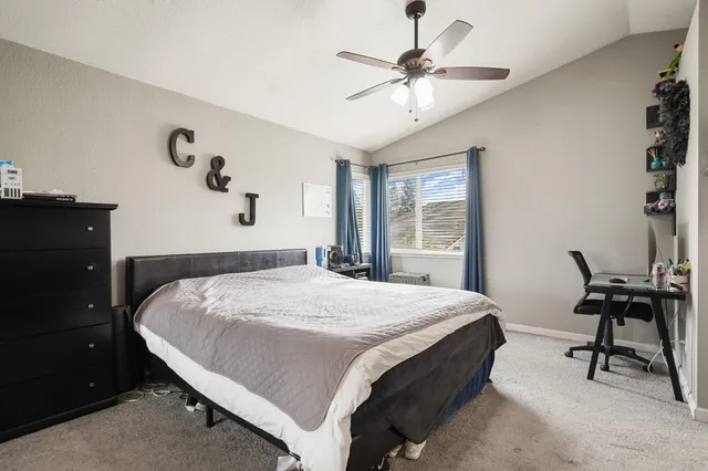 a bathroom with a sink a large mirror and a bathtub