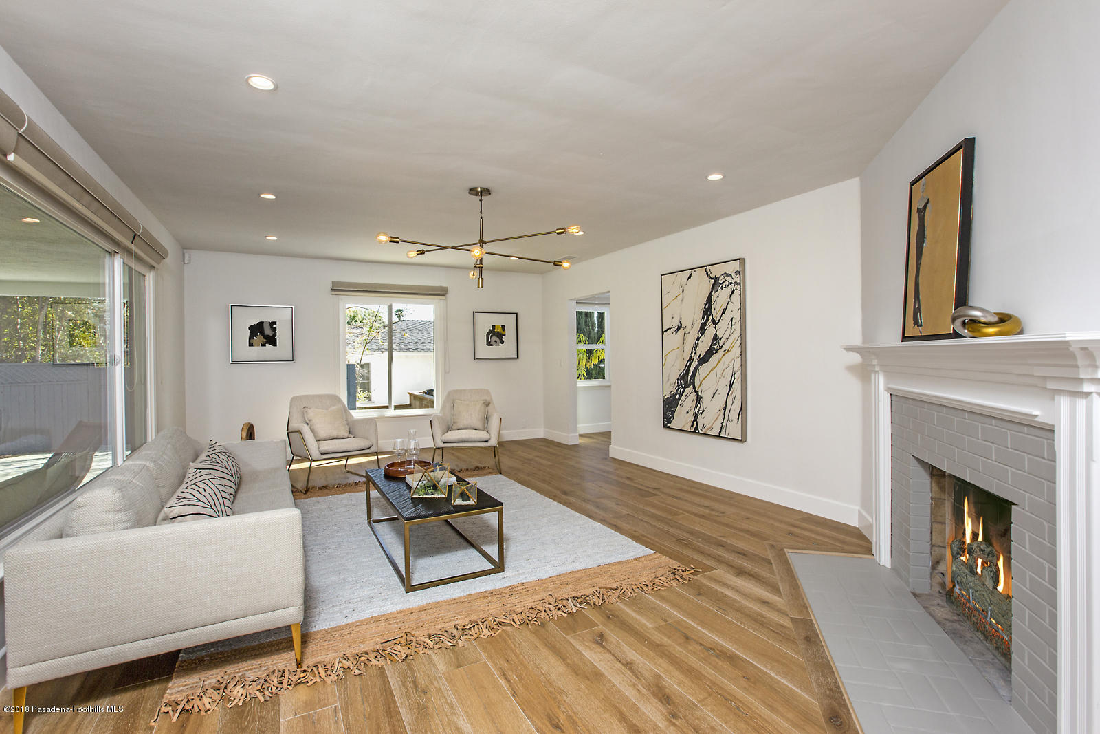 3700 Fairmeade Road Pasadena, CA 91107 - Photo 4 of 35 a living room with furniture and a fireplace